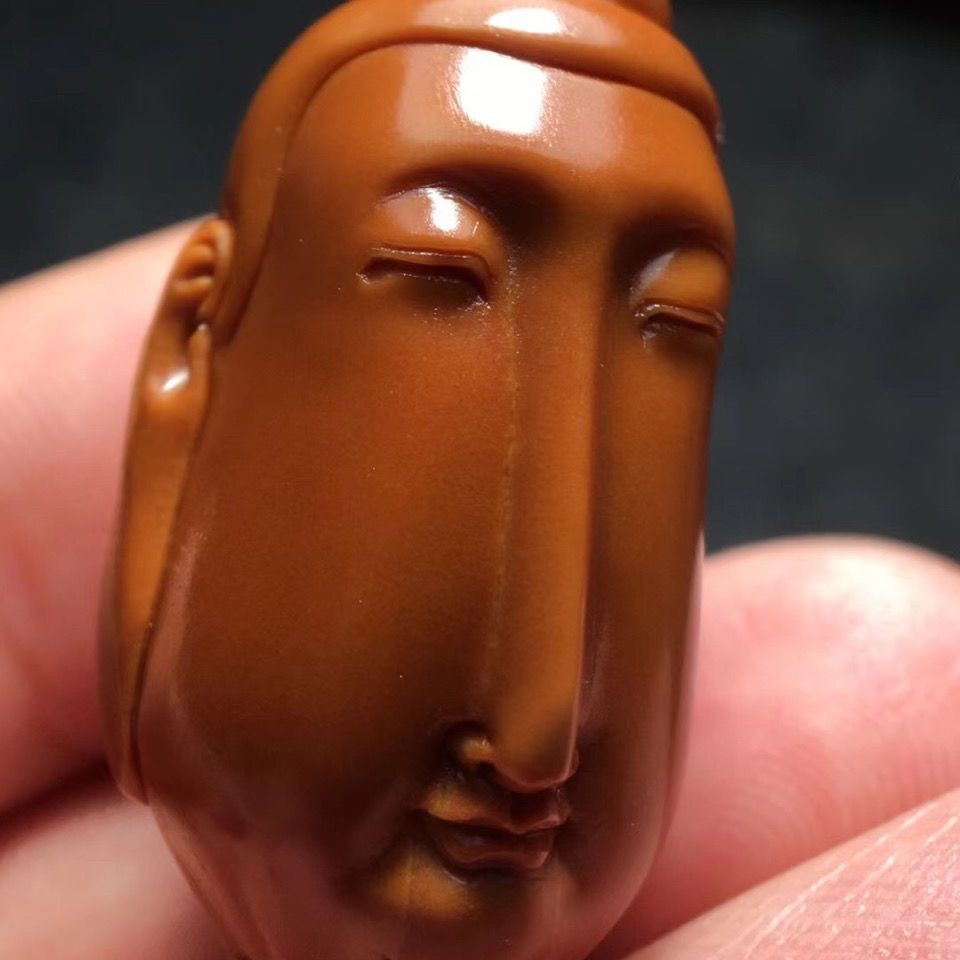 Hand Carved Olive Kernel Long Face Buddha Pendant 1.33cm Phone Charm