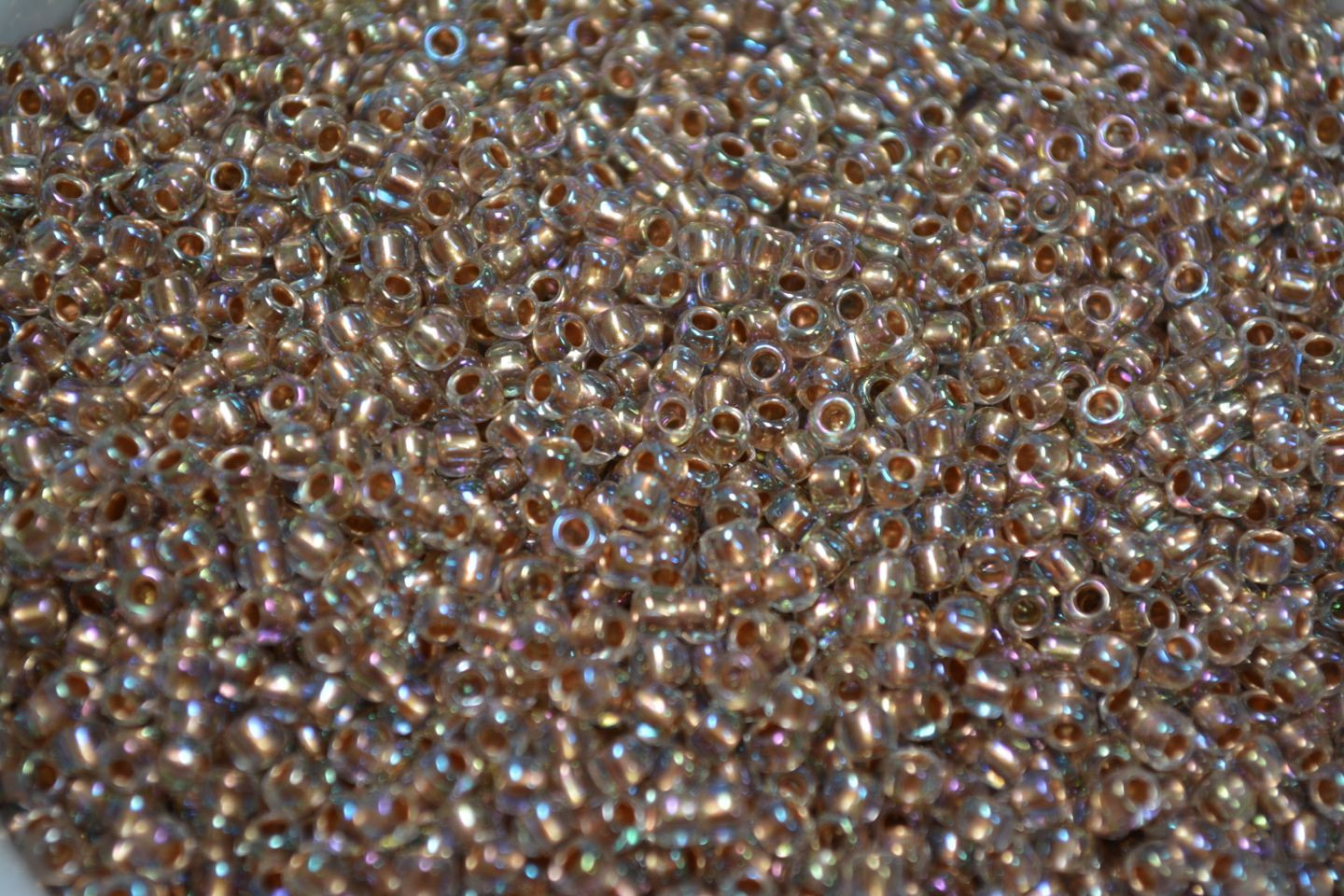 Toho Seed Beads 8/0 – Gold-Lined Rainbow Crystal