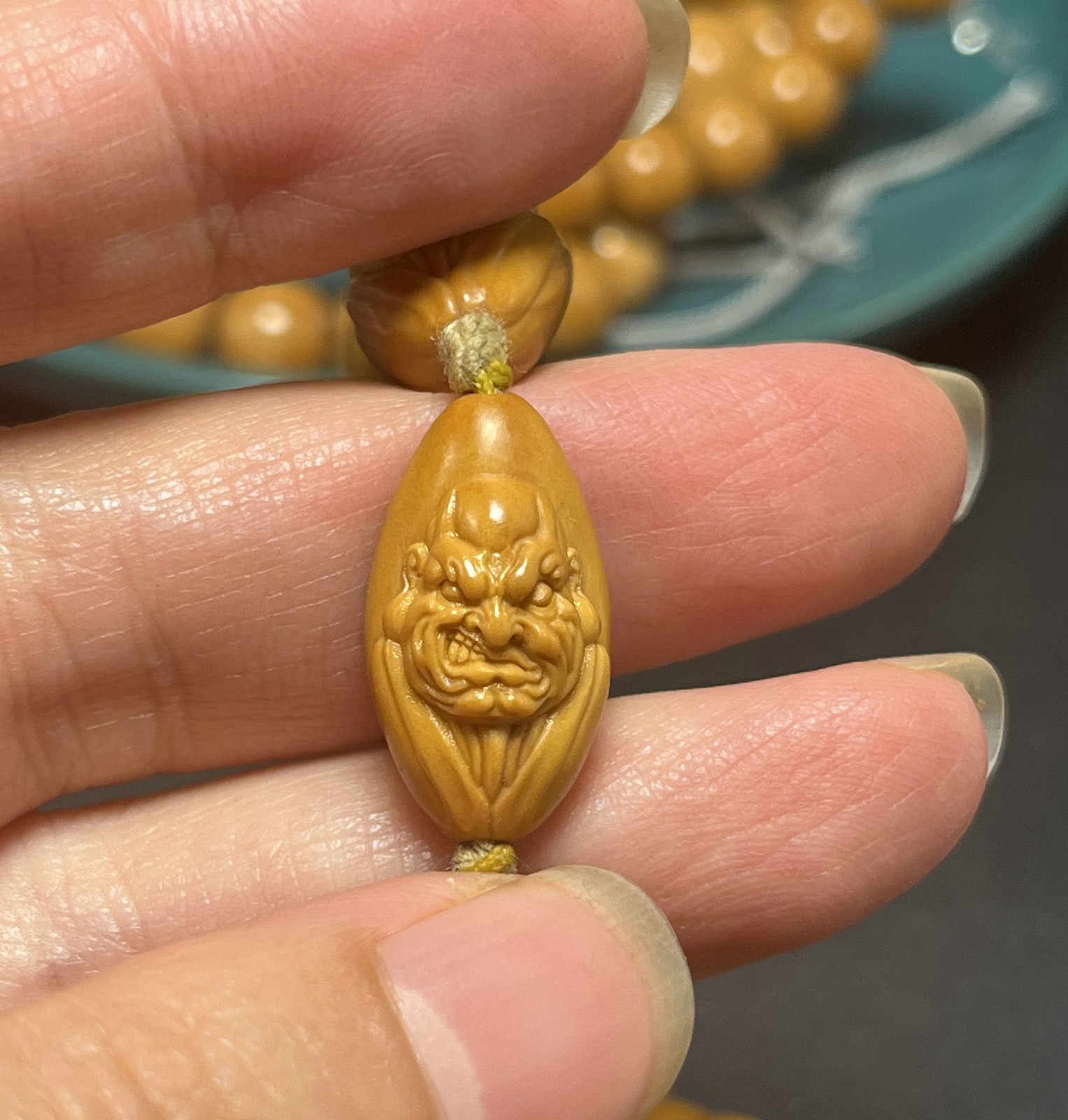China Olive Dentoliva 10PCS Mini Small Beads Relief Carving Evil Monk Bracelet