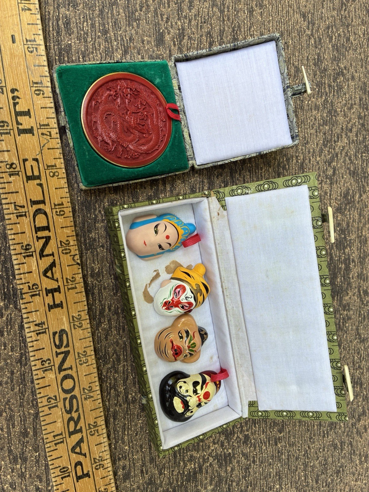 Chinese carved lacquer medallion and ceramic face mask miniatures