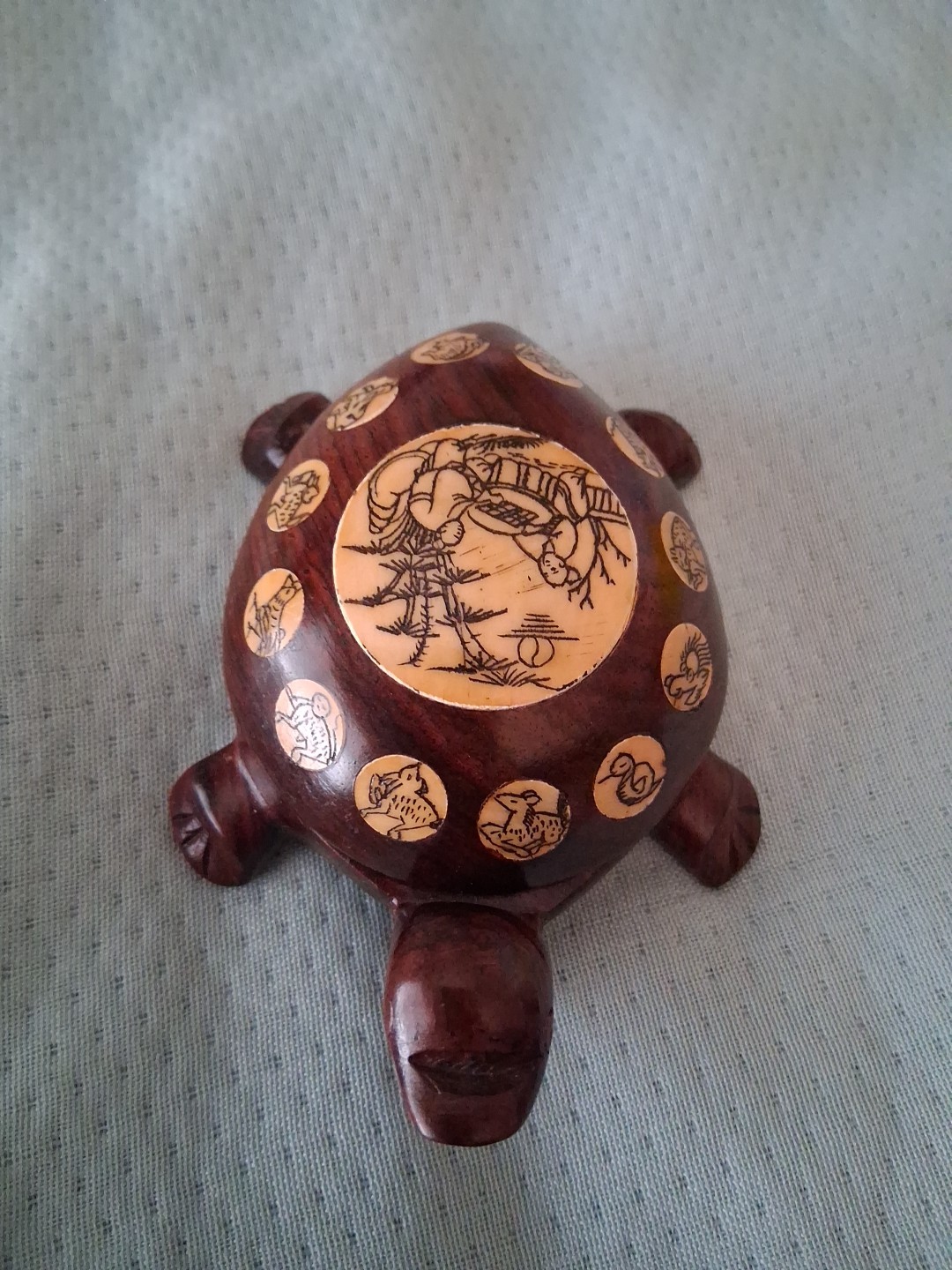 carved wood turtle with enlayed compass and chinese carved symbols