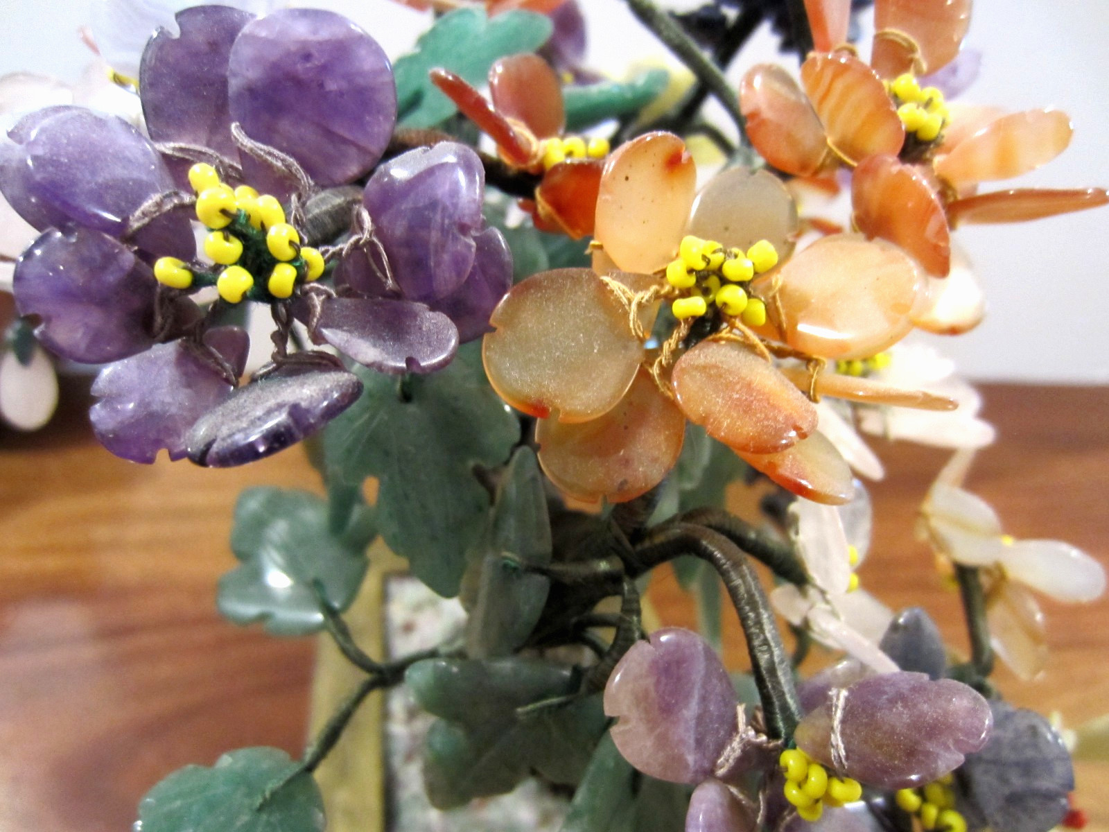large jade/stone bonsai tree with many flowers of jade, agate, amethyst,& others