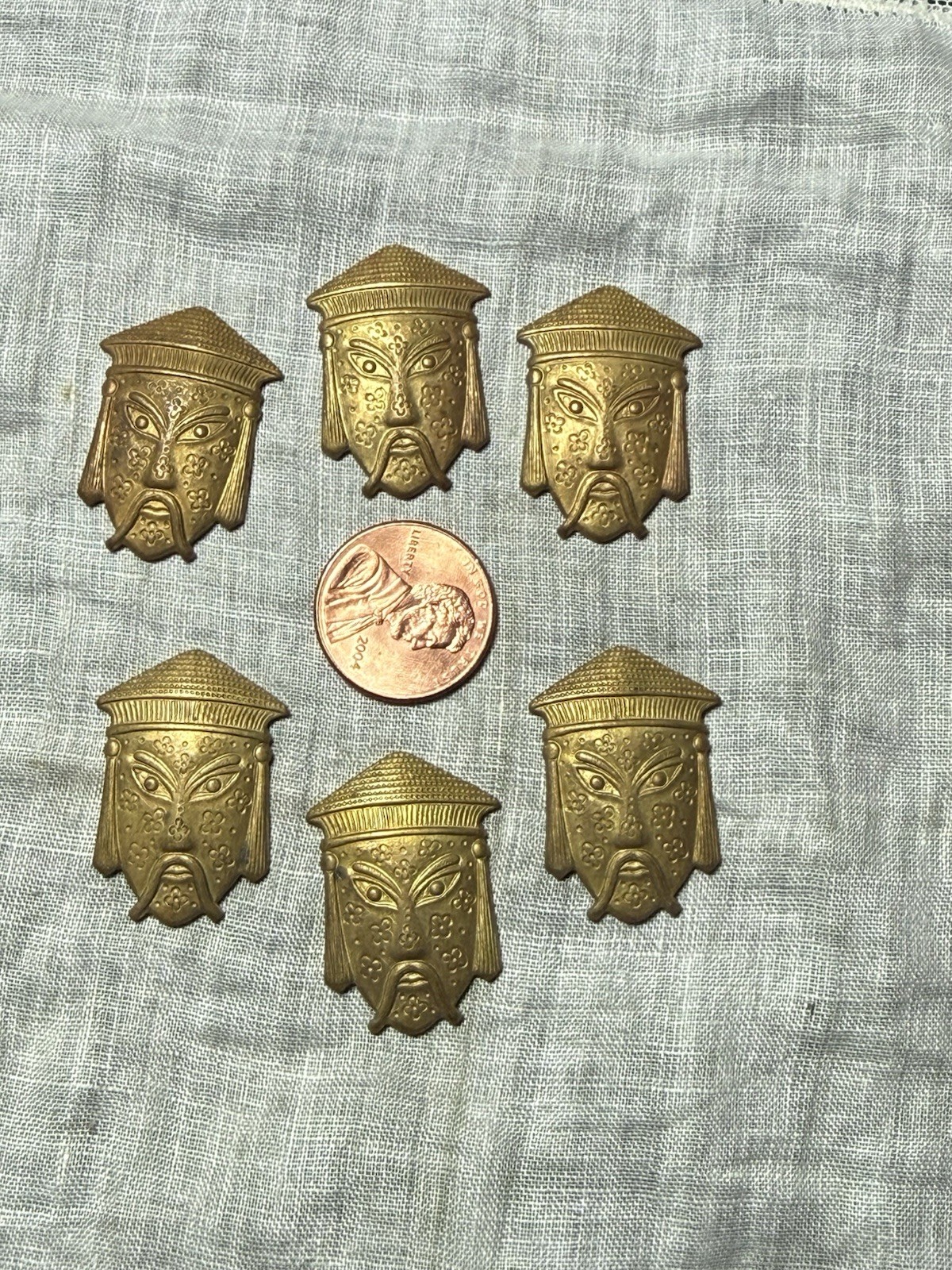 6 Chinese Mask Brass Stampings 1950s to 60s