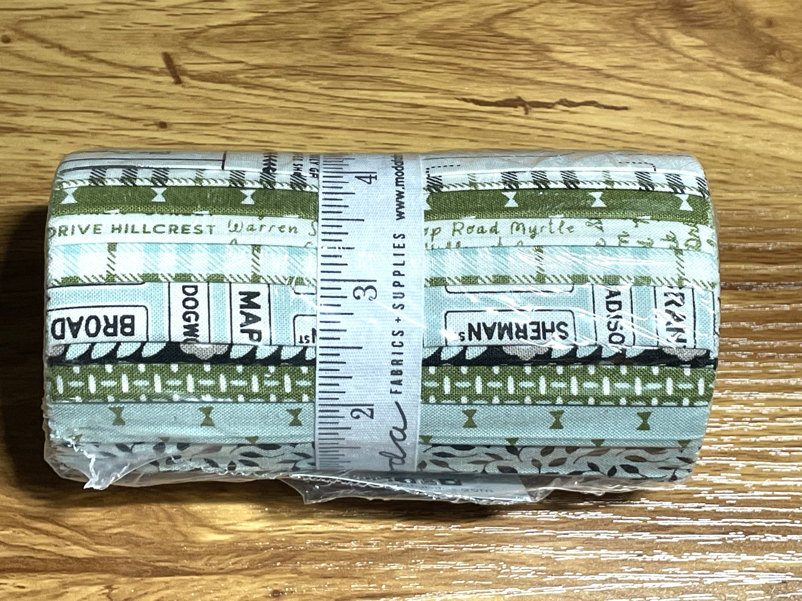 KVQG: Moda Dessert Roll 5″ Strips Main Street by Sweetwater Oct. 2023