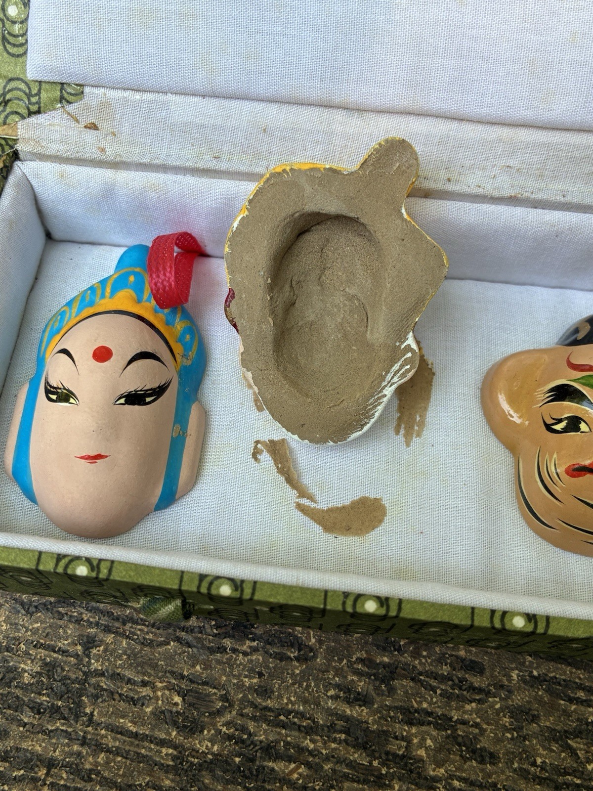 Chinese carved lacquer medallion and ceramic face mask miniatures