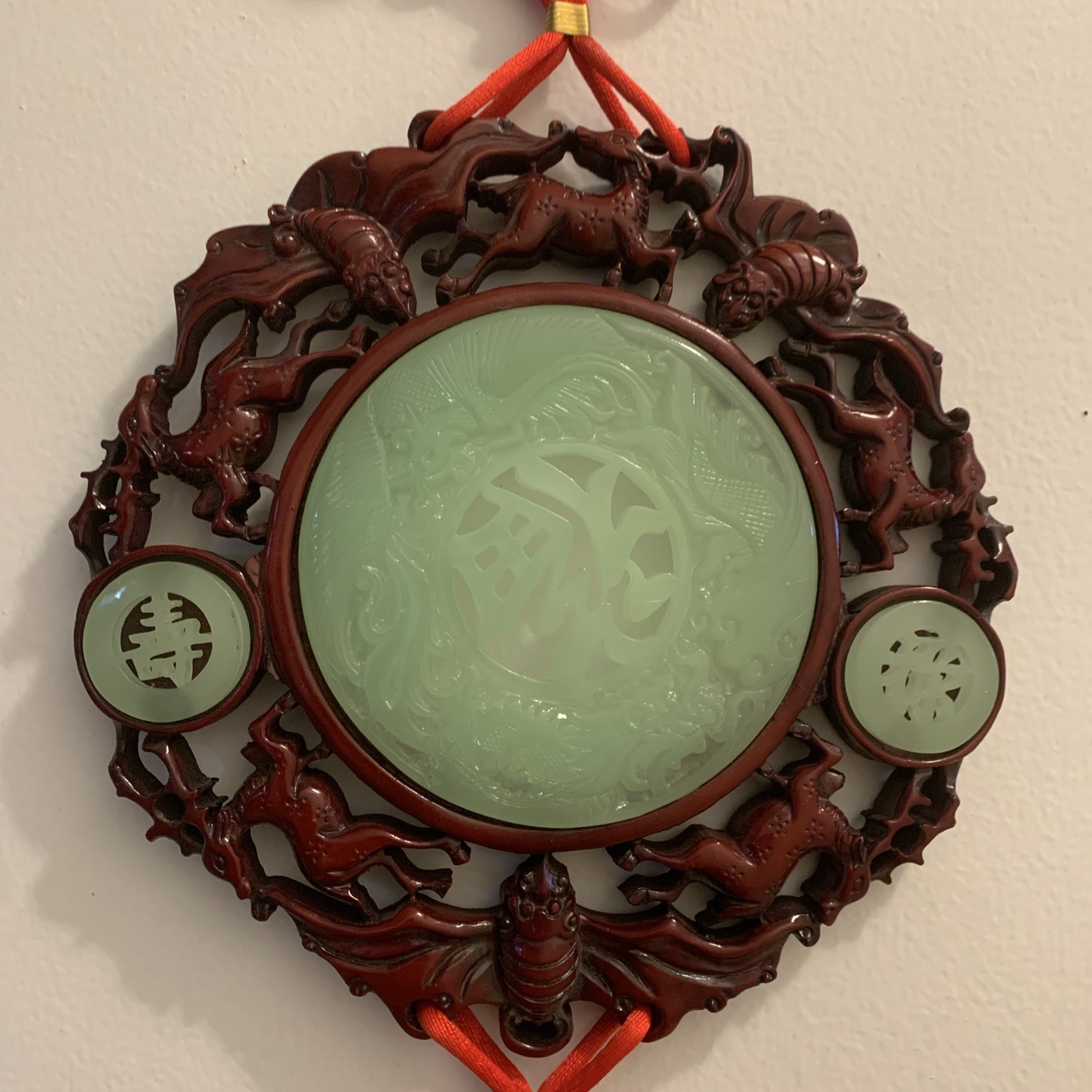 Green Red Knot hanging wall 8 1/2”Medallion w/tassels 40” long Resin Faux Jade.