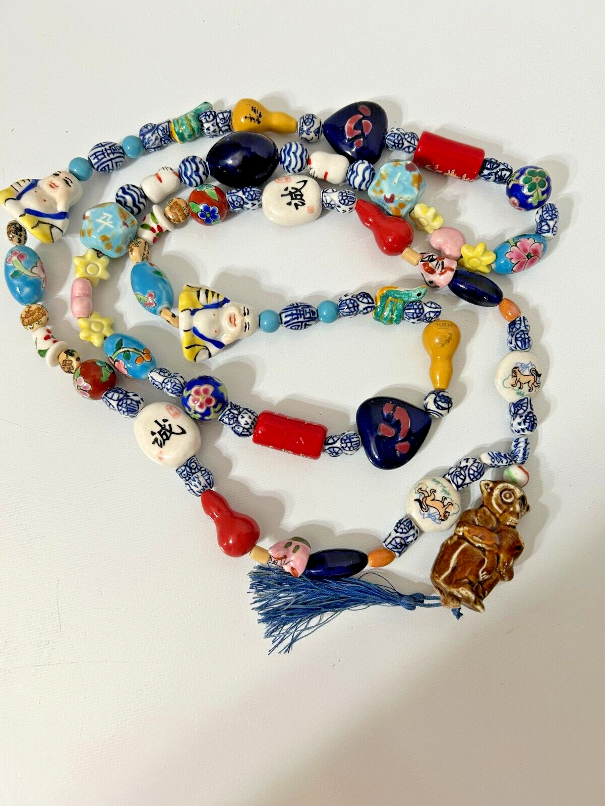 Chinese beaded necklace weighs almost 1 LB, 34 ” long Hand painted beads