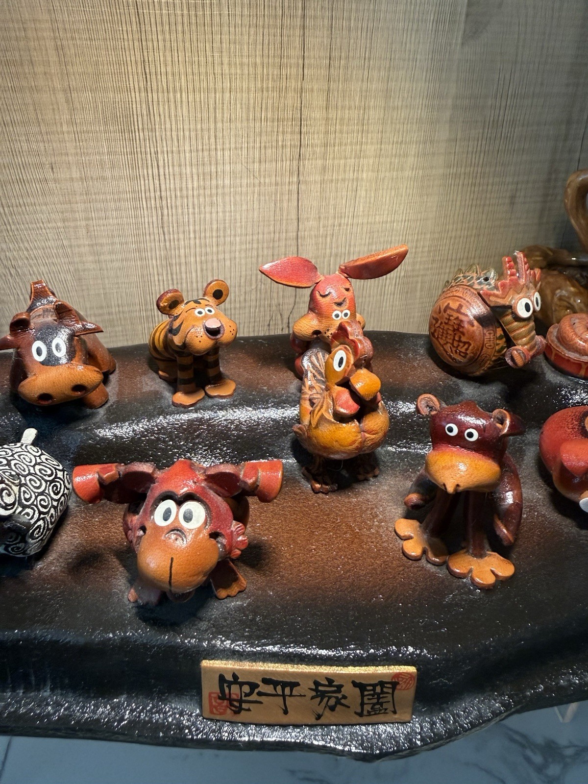 Vintage Handcrafted Leather Chinese Zodiac Animal Figurines on Display Stand
