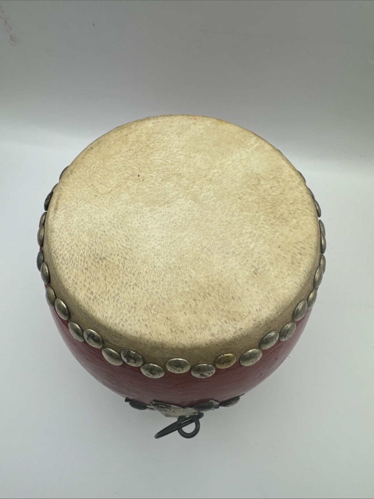 20th Century Chinese Traditional Small Red Tanggu. Wood, Cowhide, Metal 6×6 In.