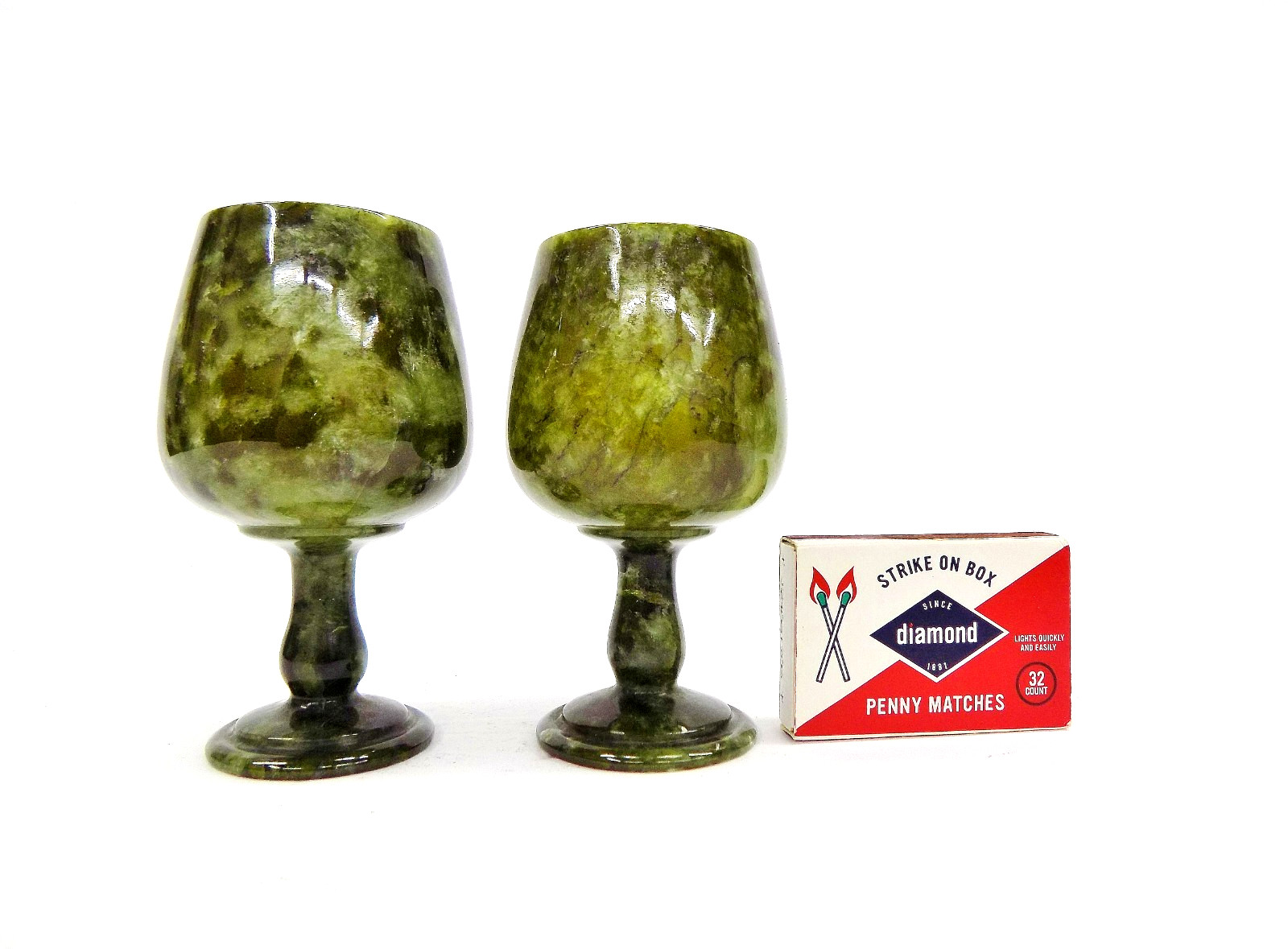 A Fine Quality Pair of Antique Chinese Carved Translucent Spinach Jade Cordials