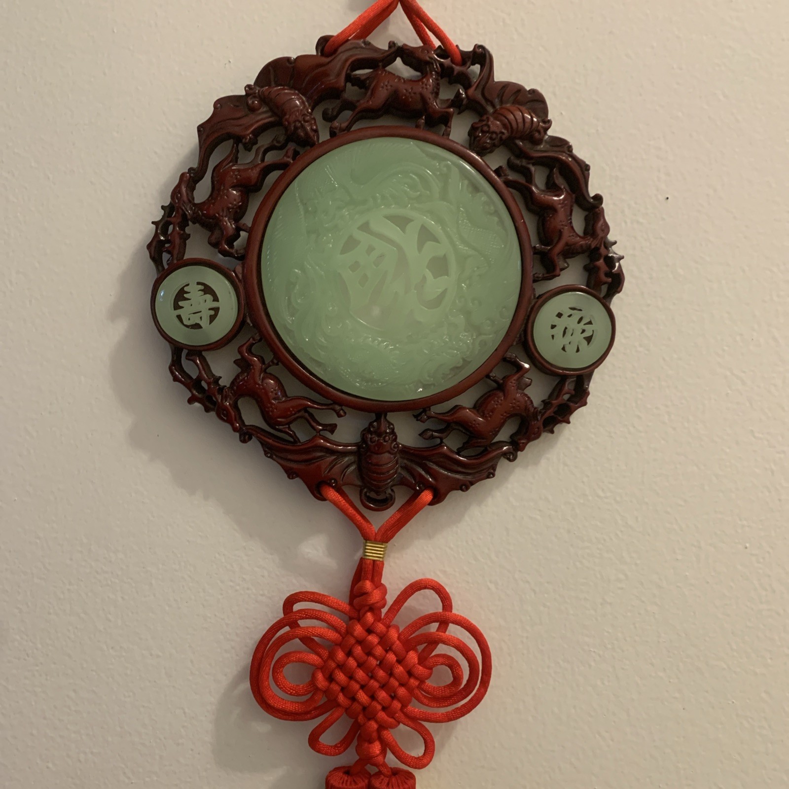 Green Red Knot hanging wall 8 1/2”Medallion w/tassels 40” long Resin Faux Jade.