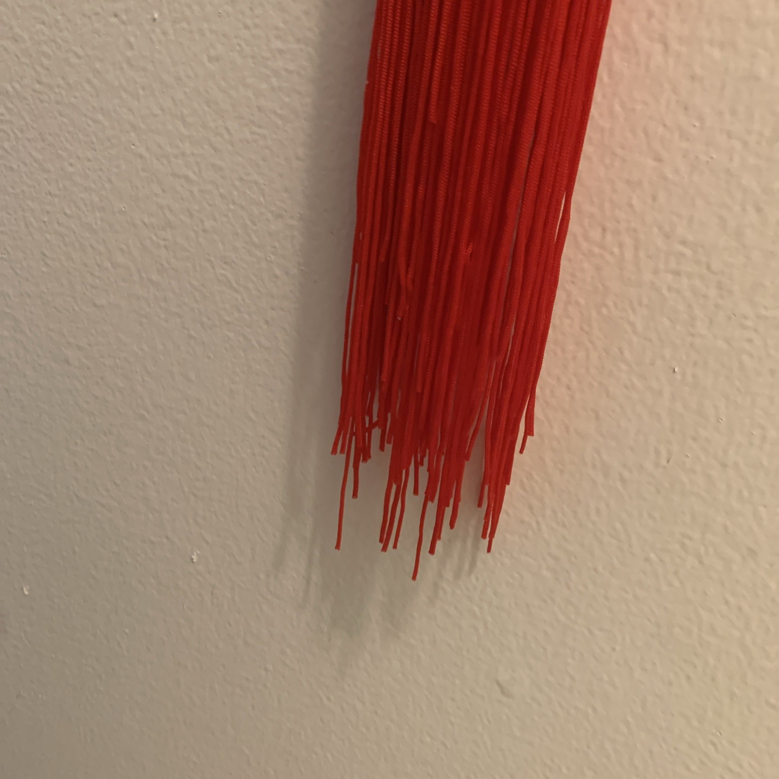 Green Red Knot hanging wall 8 1/2”Medallion w/tassels 40” long Resin Faux Jade.