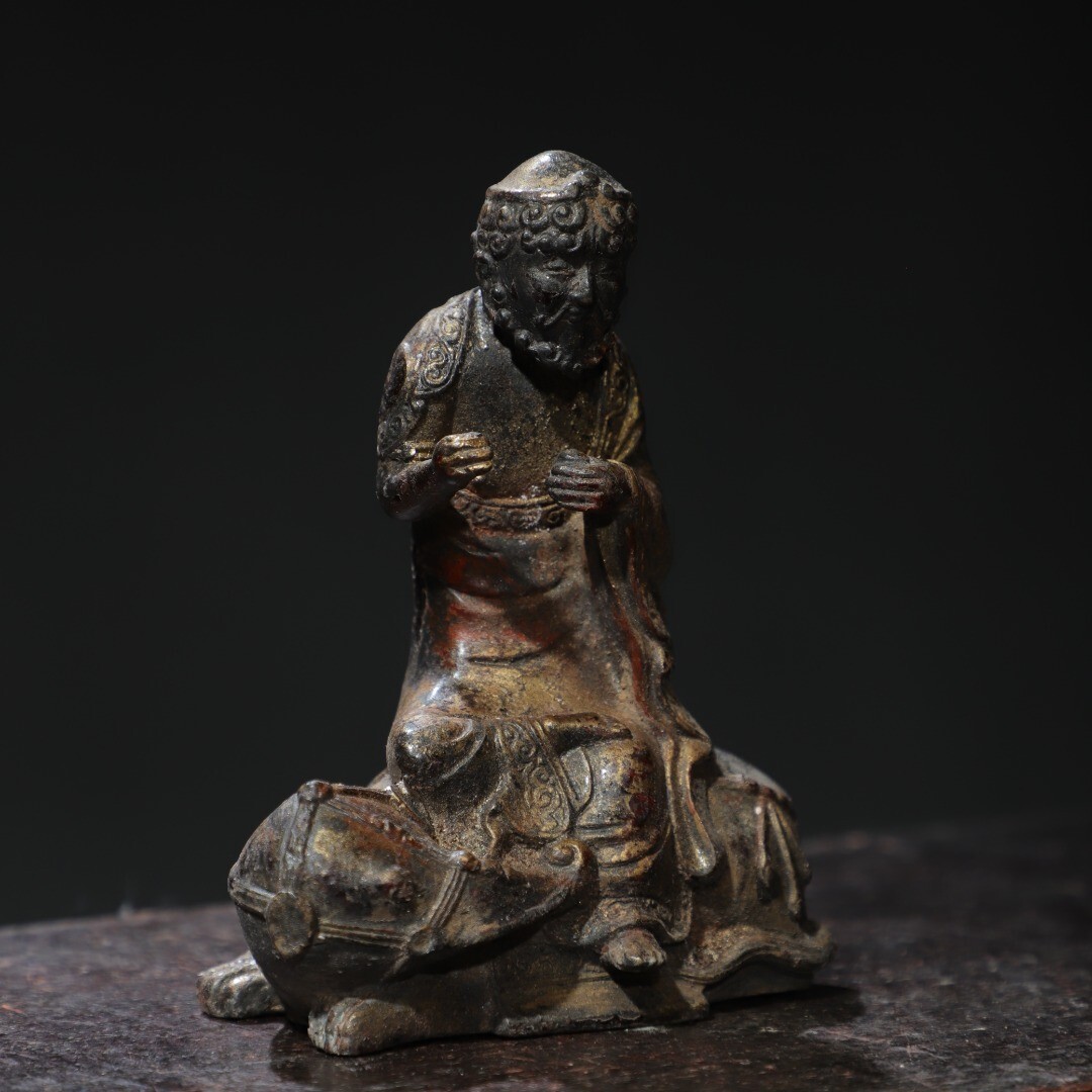 Bronze and gold [Arhat] Buddha statue