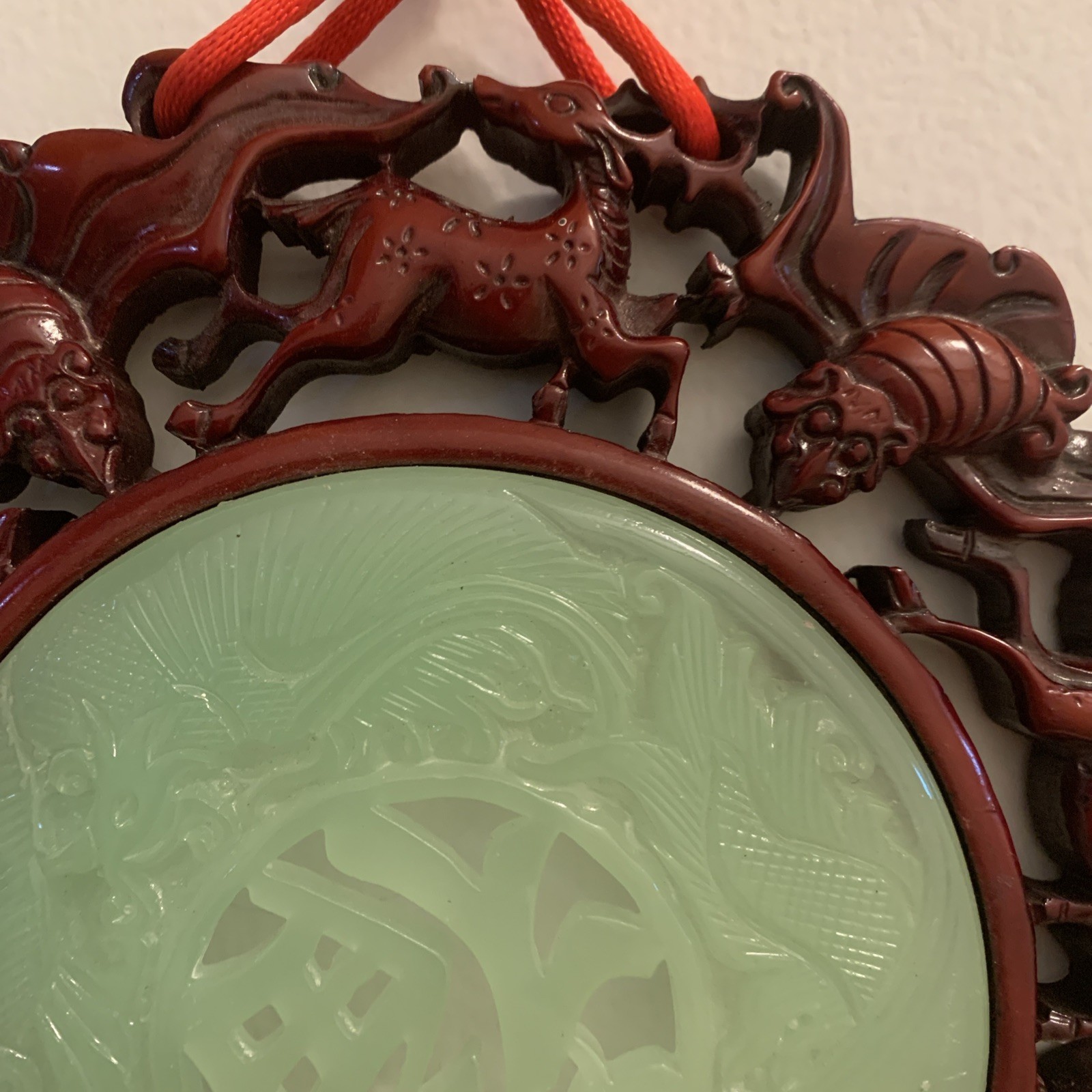 Green Red Knot hanging wall 8 1/2”Medallion w/tassels 40” long Resin Faux Jade.