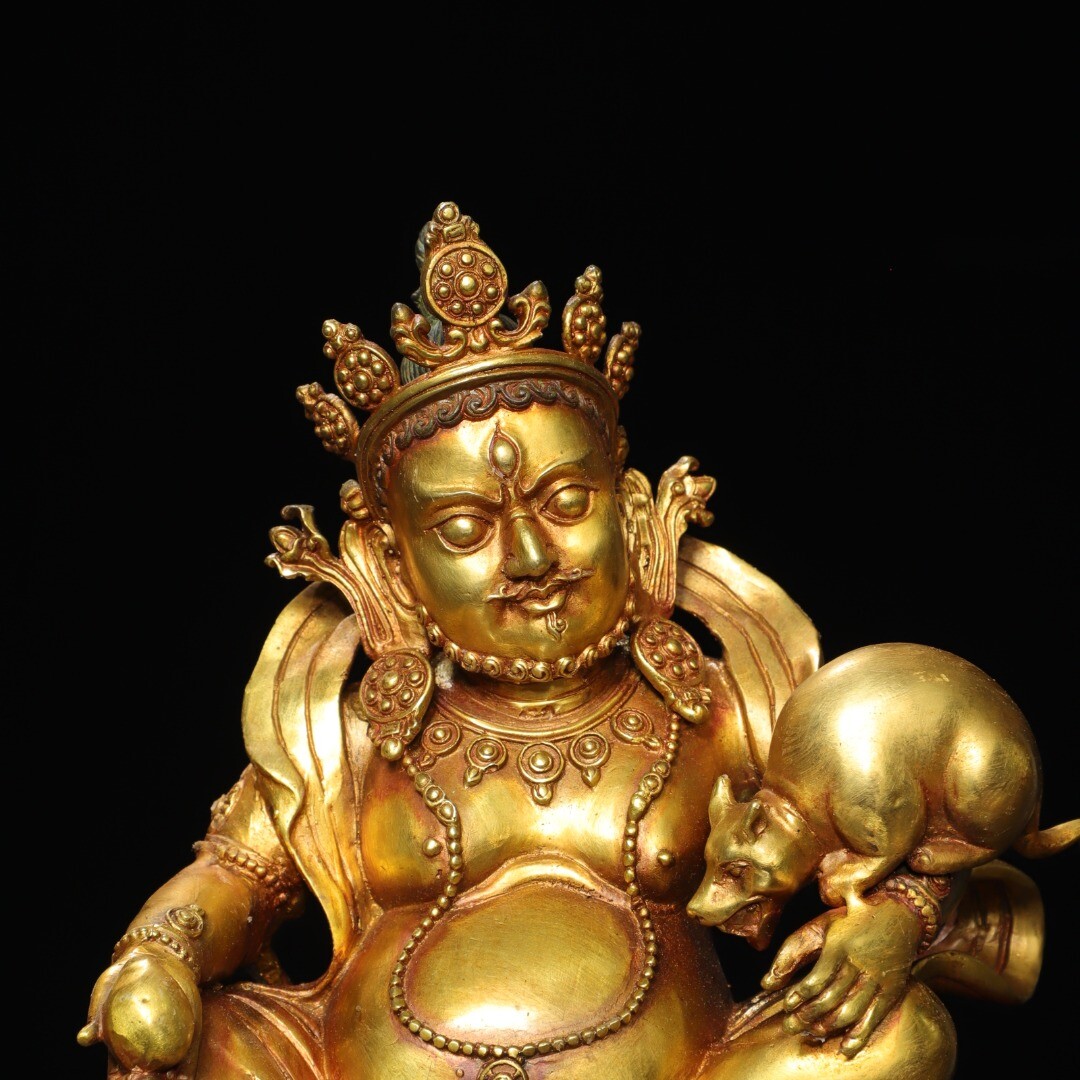 Bronze gilded statue of the Yellow God of Wealth Buddha