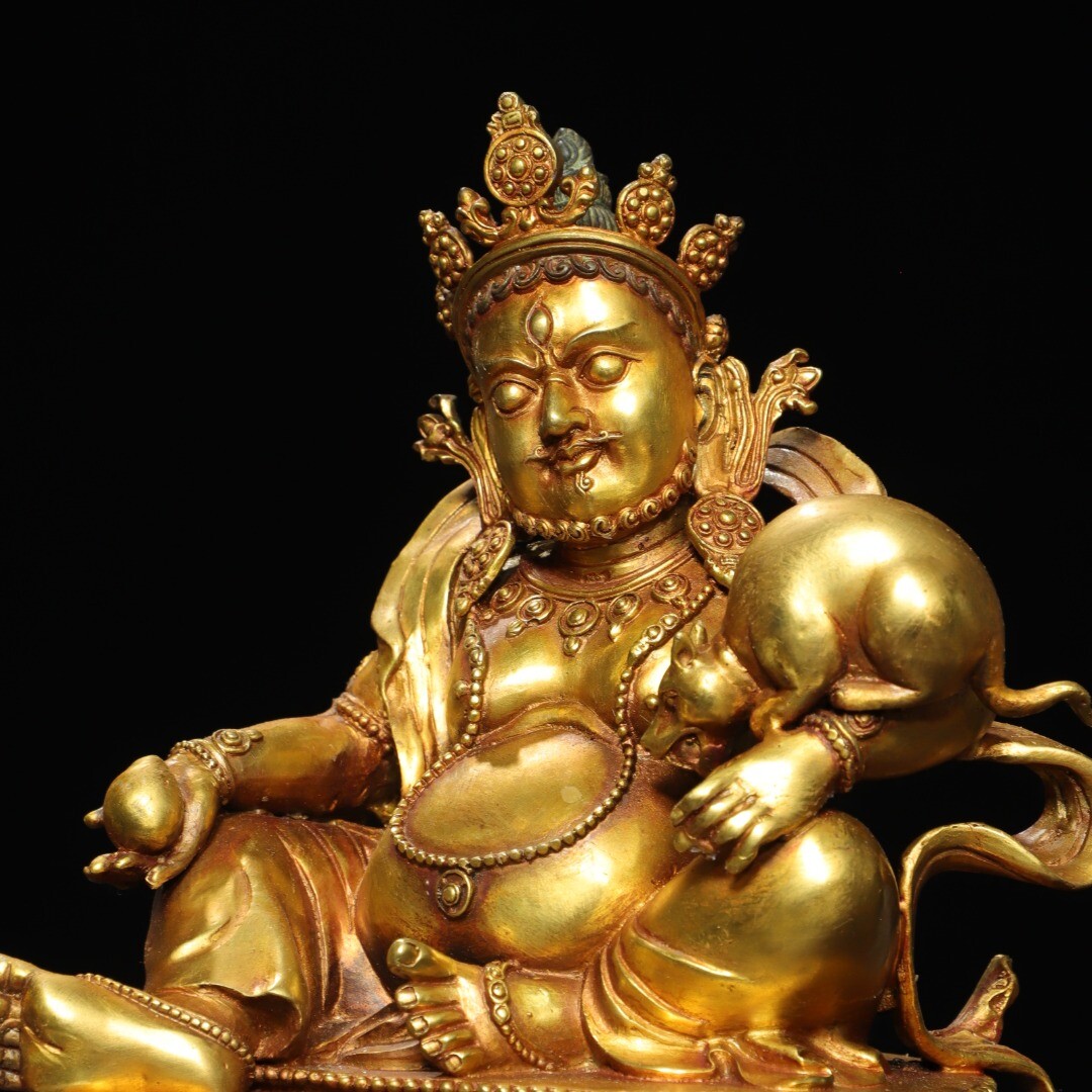 Bronze gilded statue of the Yellow God of Wealth Buddha