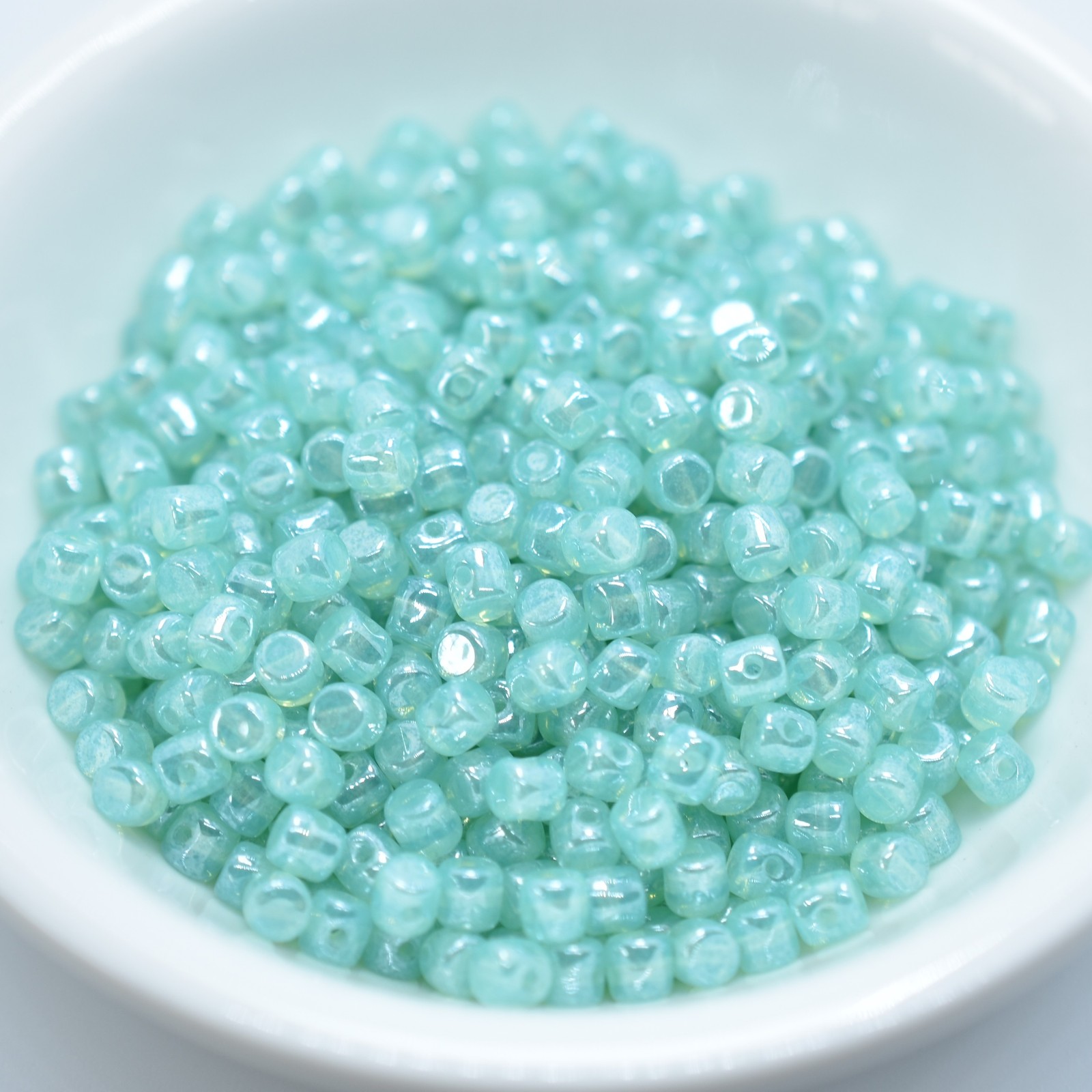 Minos Par Puca® 5 grams – Blue Green Opal Luster – 2.5x3mm Cylinder Czech Beads
