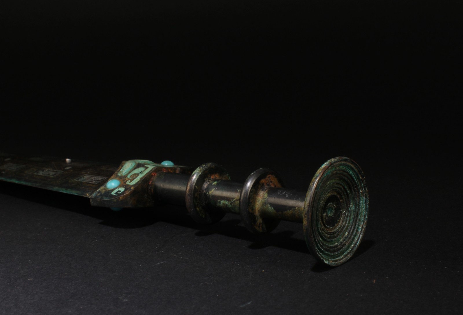 A Bronze Decorative Sword, decorated with turquoise inlaid