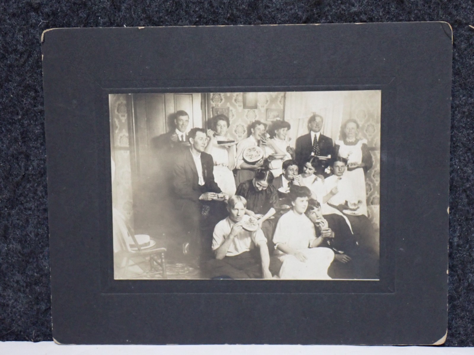 Antique 1910s Photo Group Eating Watermelon Indoors Parlor Edwardian Mounted B&W