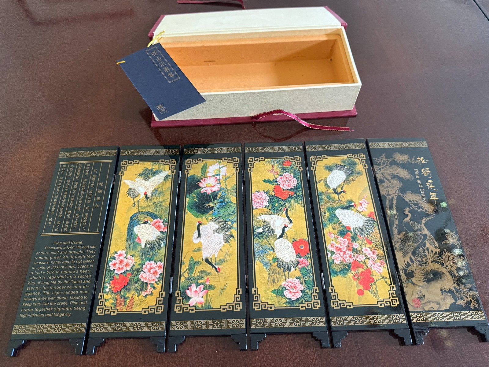 Asian Lacquer Table Folding Screen features a beautiful “Pine & Crane” scenes