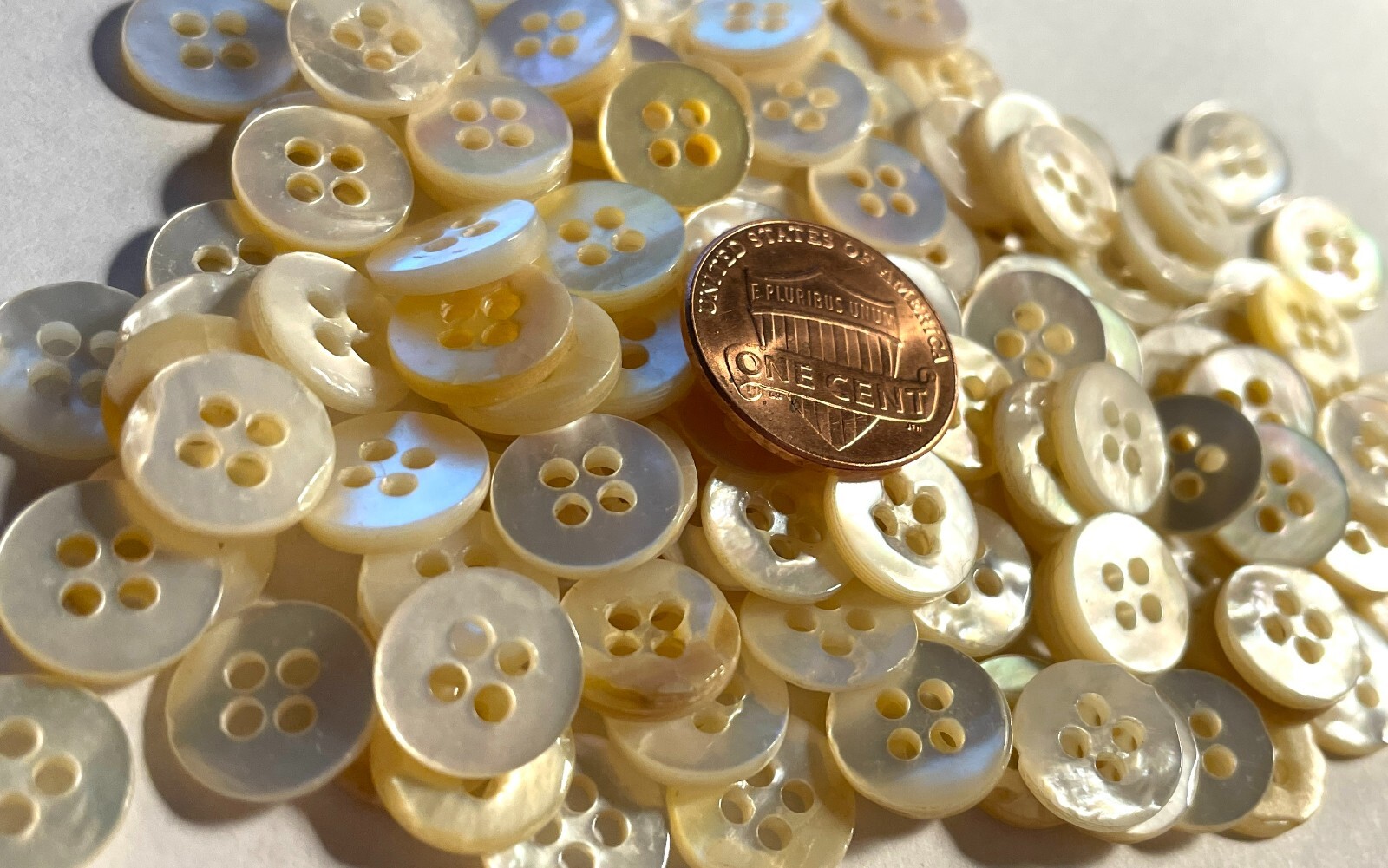 8 Small Iridescent Cream Pale Yellow Shell MOP Sew-thru Buttons 11mm 7/16″ 12769