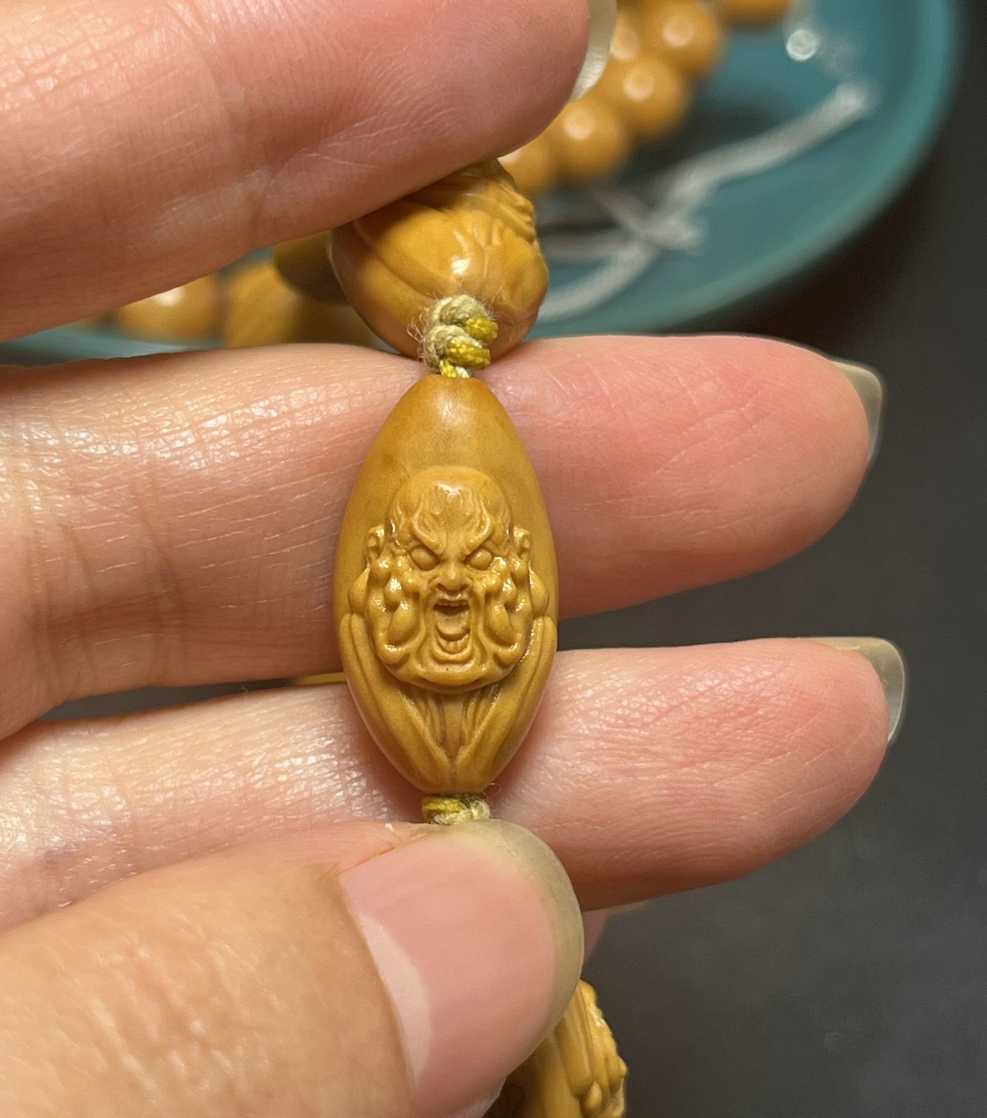 China Olive Dentoliva 10PCS Mini Small Beads Relief Carving Evil Monk Bracelet