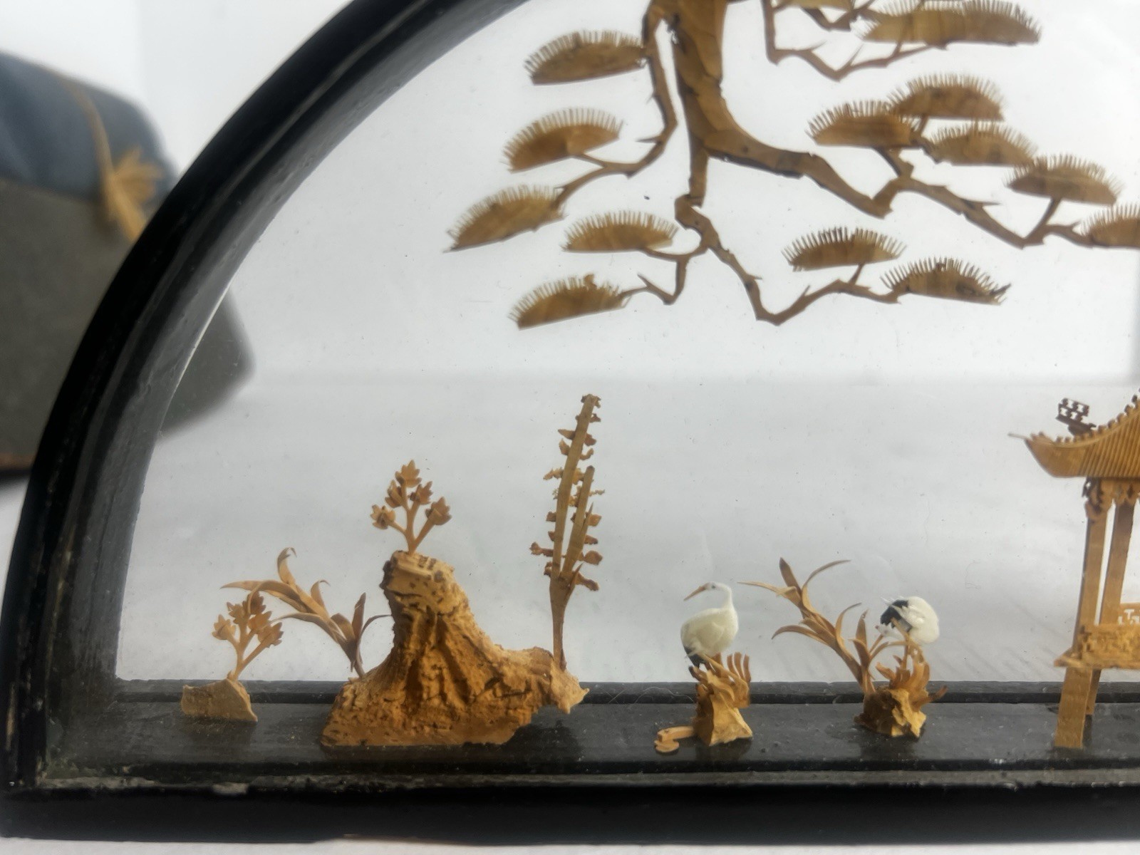 Chinese hand-carved cork diorama sculpture housed in a black wood and glass