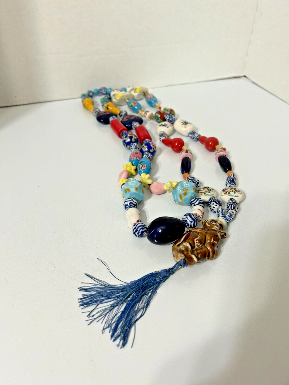 Chinese beaded necklace weighs almost 1 LB, 34 ” long Hand painted beads