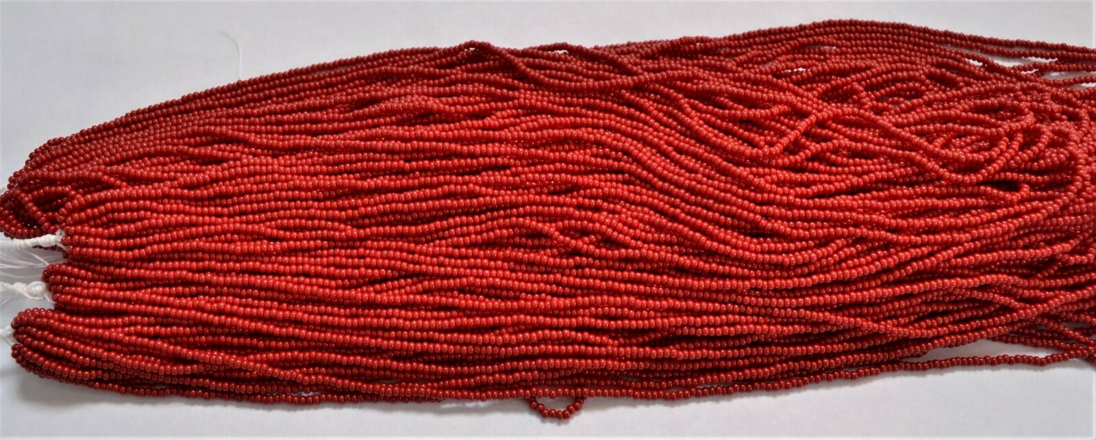 Dark Red Czech PRECIOSA® rocailles glass 11/0 seed beads, Hank/12 strands .