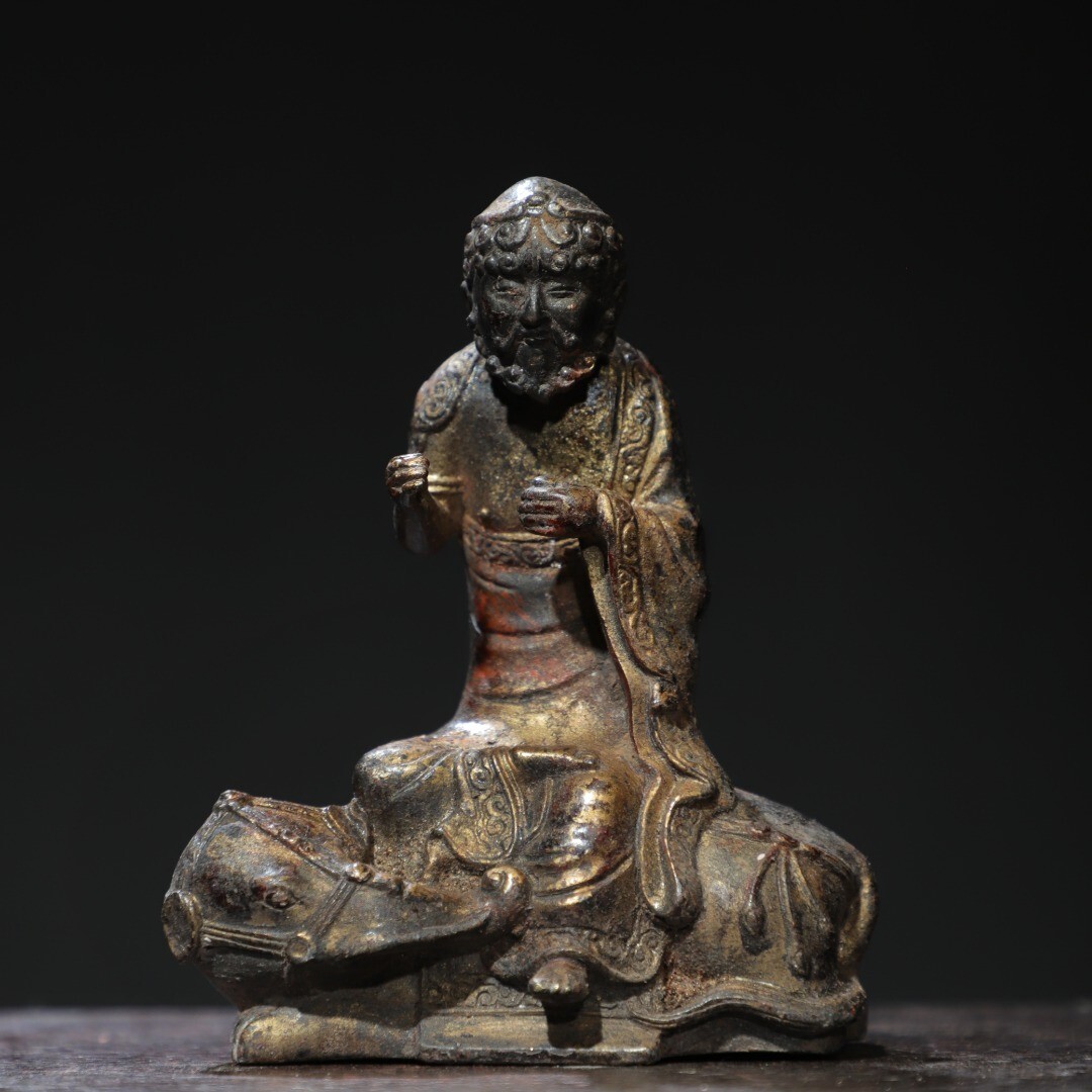 Bronze and gold [Arhat] Buddha statue