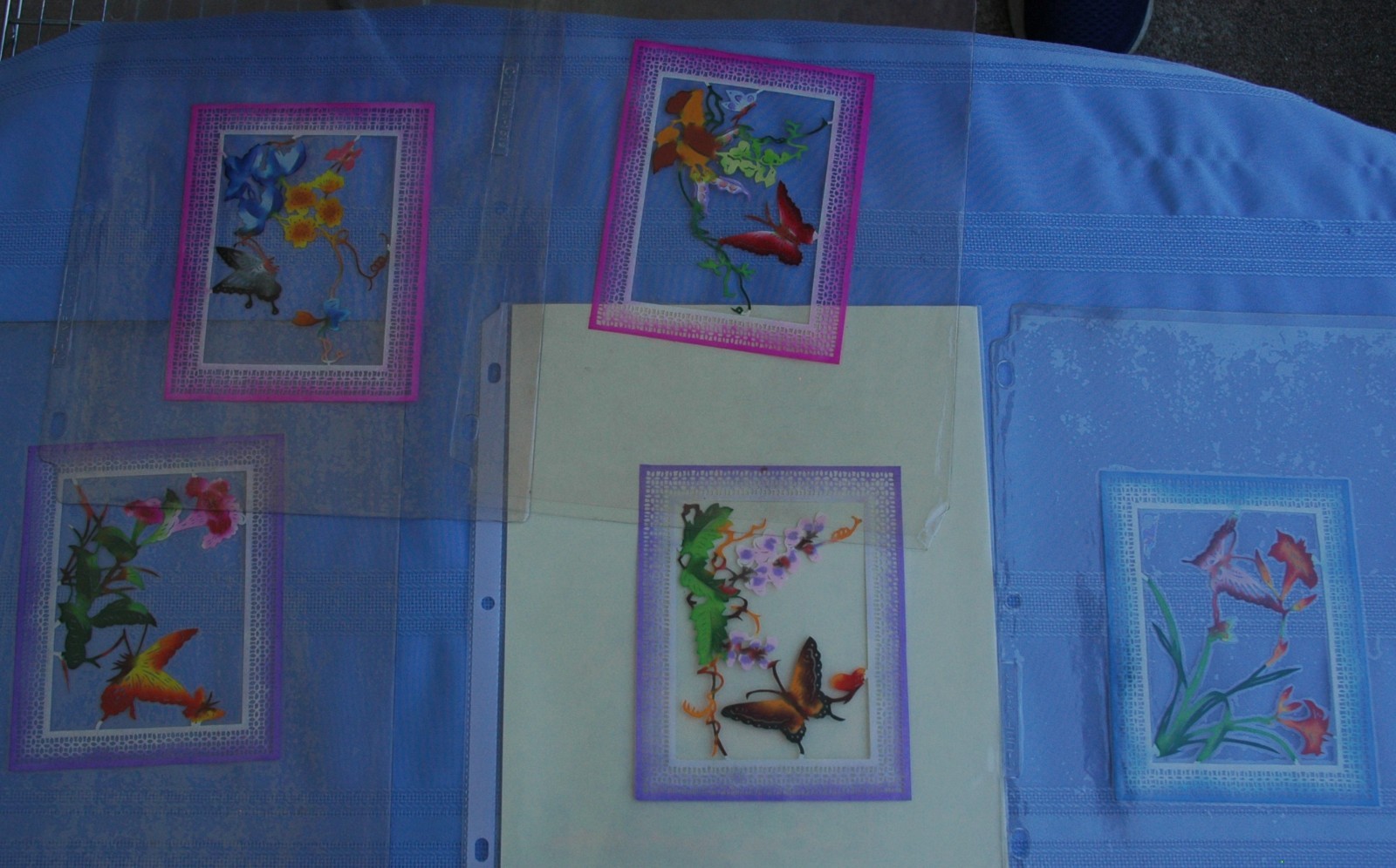 Vintage Lot of about 70 Chinese Paper Cuts in Plastic Protector Sheets Plus Book