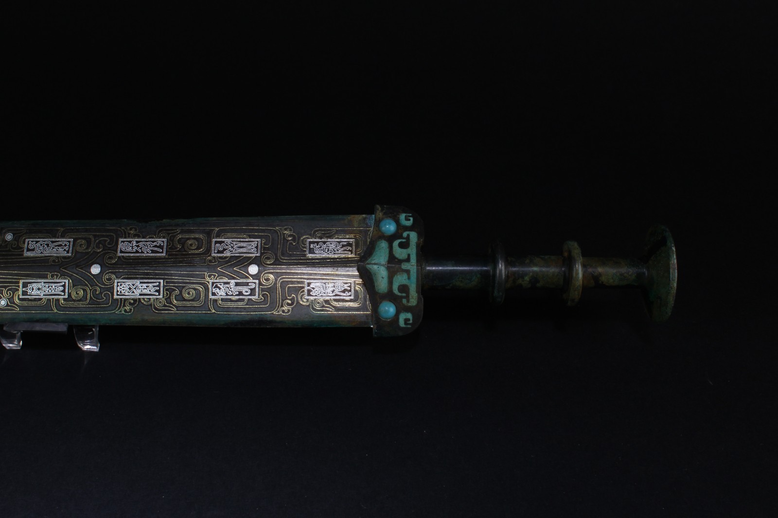 A Bronze Decorative Sword, decorated with turquoise inlaid
