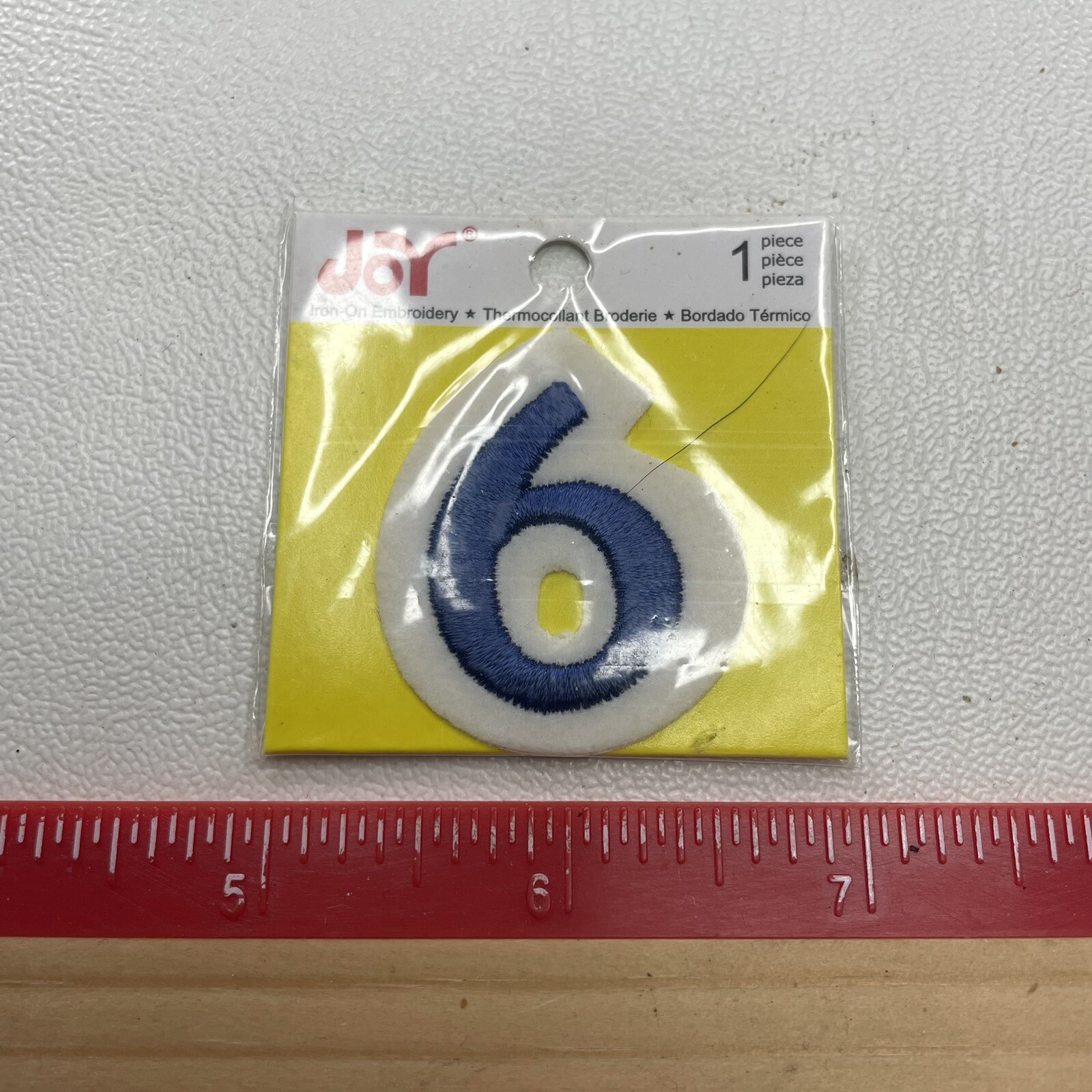 In Package Approx. 1.5” Blue & White Number 6 (#6) Patch B044