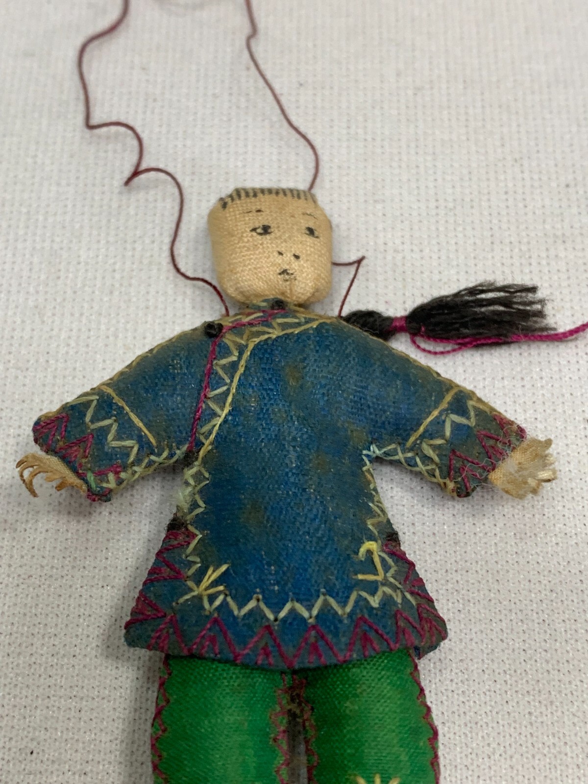 Early 1900’s Miniature Asian handmade cloth hanging ornament Human Figure 3″