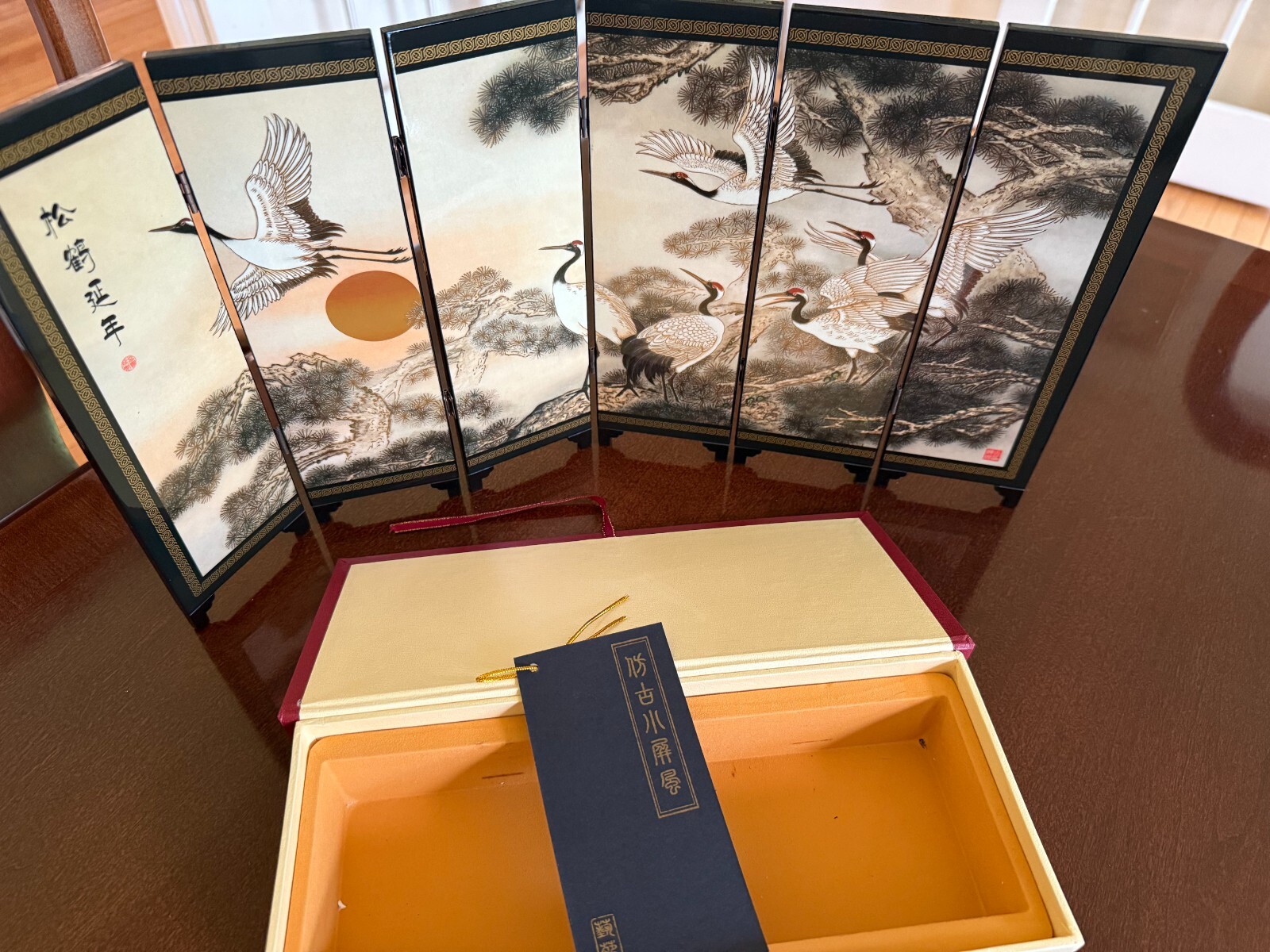 Asian Lacquer Table Folding Screen features a beautiful “Pine & Crane” scenes