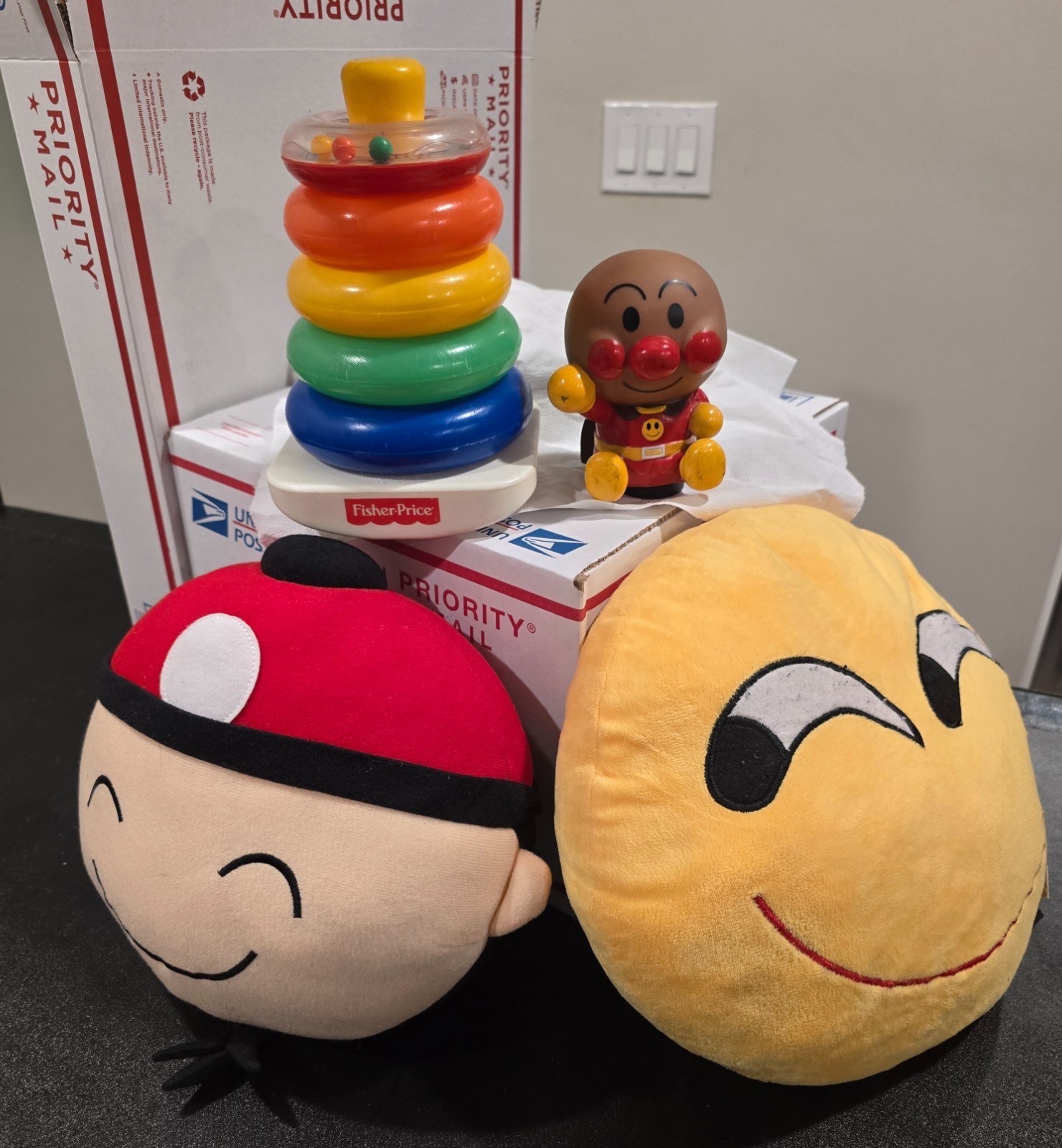 Lot of 4 PRE-OWNED USED POPULAR ASIAN AND WESTERN TOYS-tags are to Smile Emoji