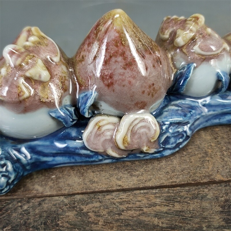 8.9″ Chinese Blue-and-white Porcelain Red Glaze Longevity Peach Pen Rack
