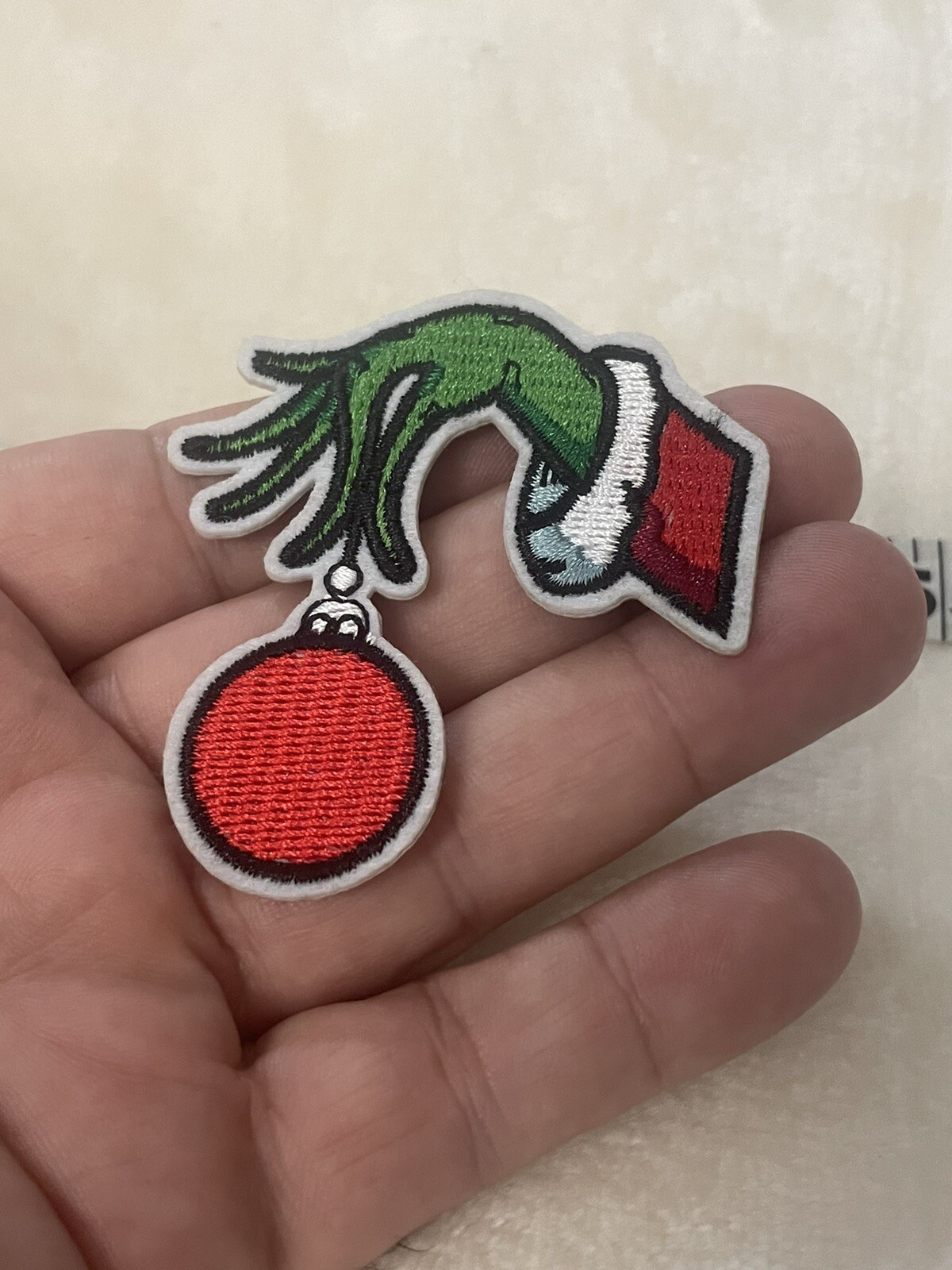 Christmas Grinch Hand Holding Red Ornament Iron On Patch Cute New