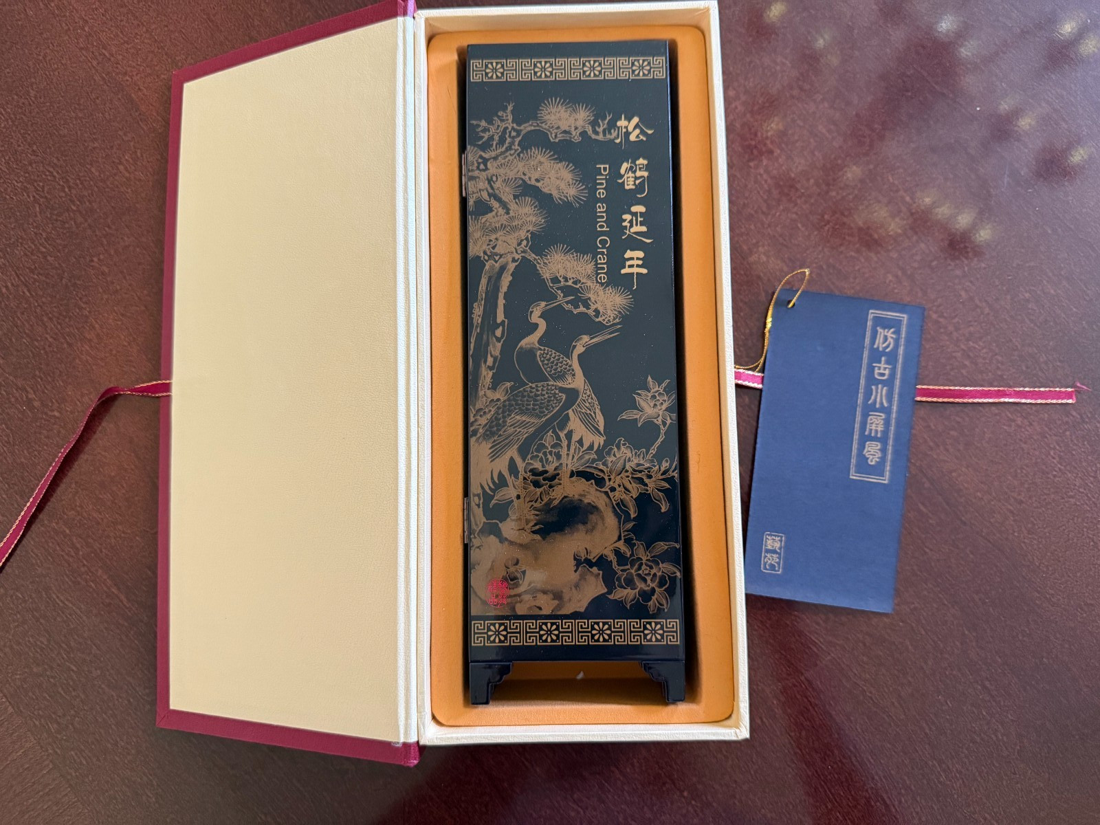 Asian Lacquer Table Folding Screen features a beautiful “Pine & Crane” scenes