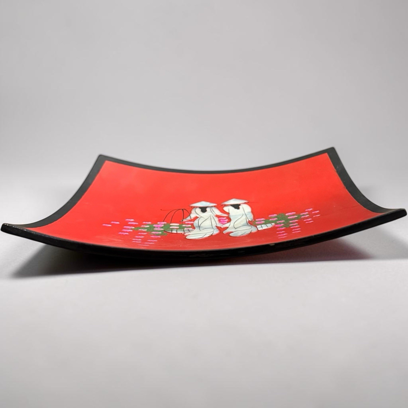 Vietnamese red lacquer decorative tray featuring mother-of-pearl inlay art.