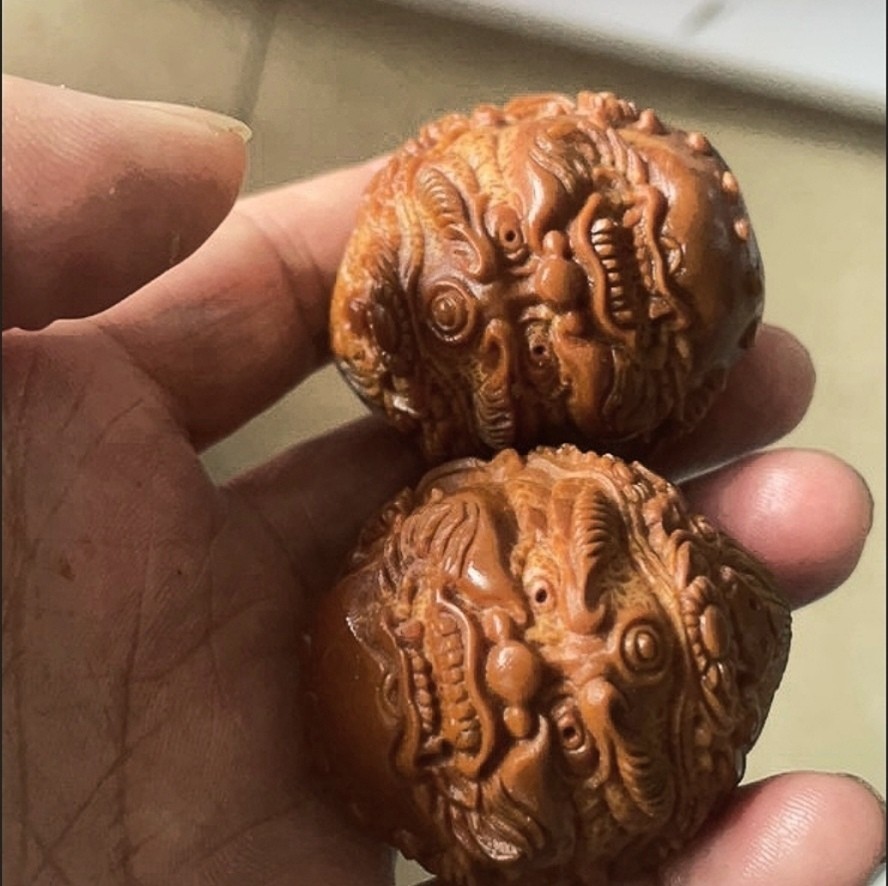 Vintage Brazilian Olive Nut Carved Mahakala Hand Balls Pair 3.5cm