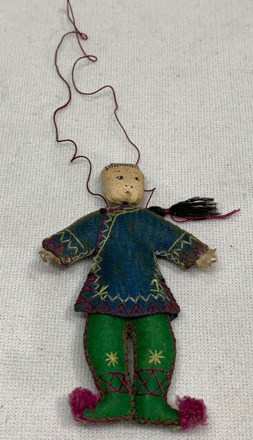 Early 1900’s Miniature Asian handmade cloth hanging ornament Human Figure 3″