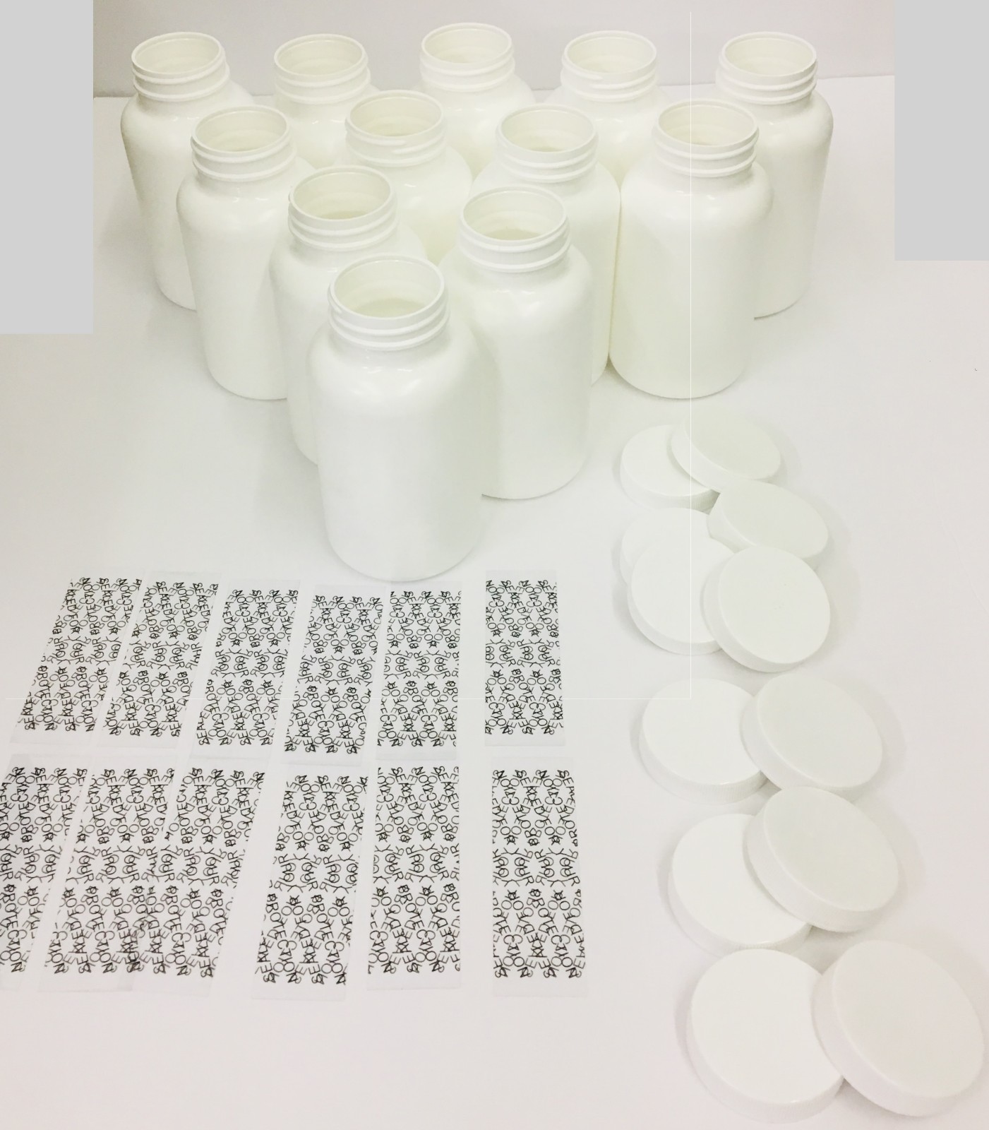 Plastic Bottles Set of 12 HDPE 200cc pill packer bottle. With caps and seals.