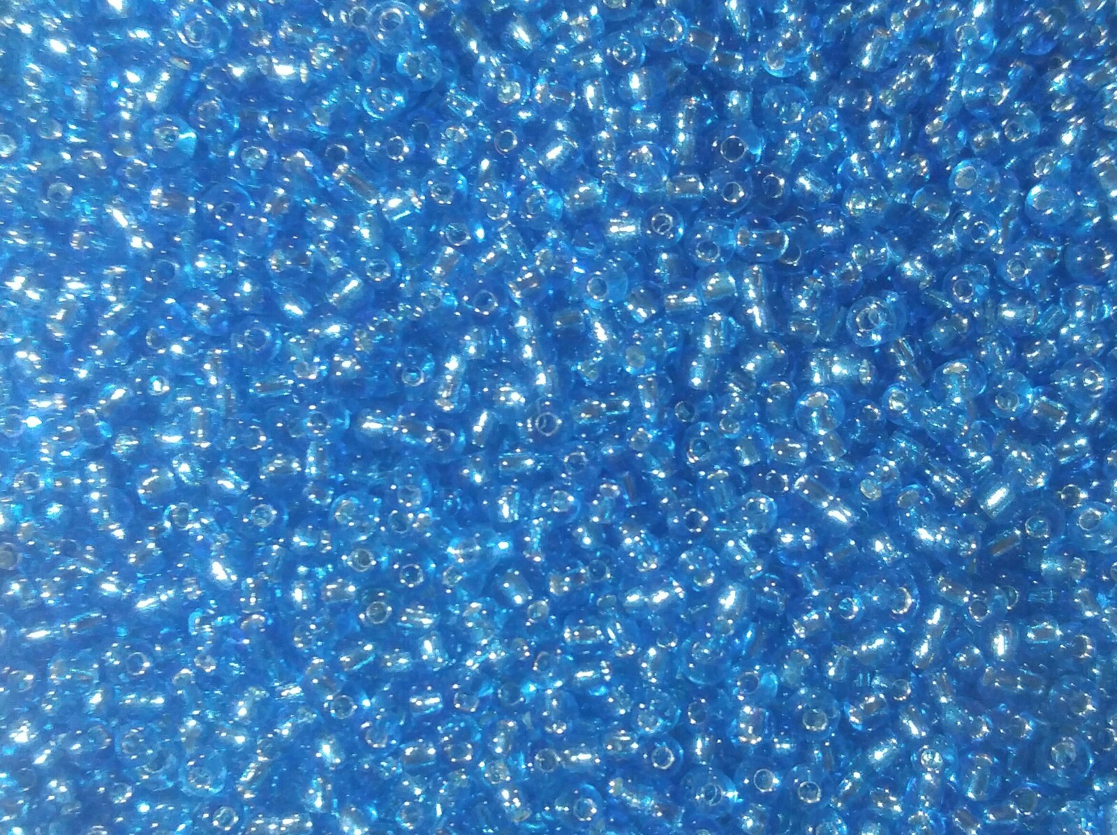 10/0 Glass Seed Beads Aqua Blue Silver Lined, Loose 28gr./1oz. bag