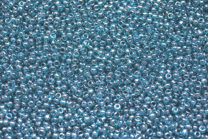 Toho Seed Beads 8/0 – Inside Rainbow Crystal/Teal Lined