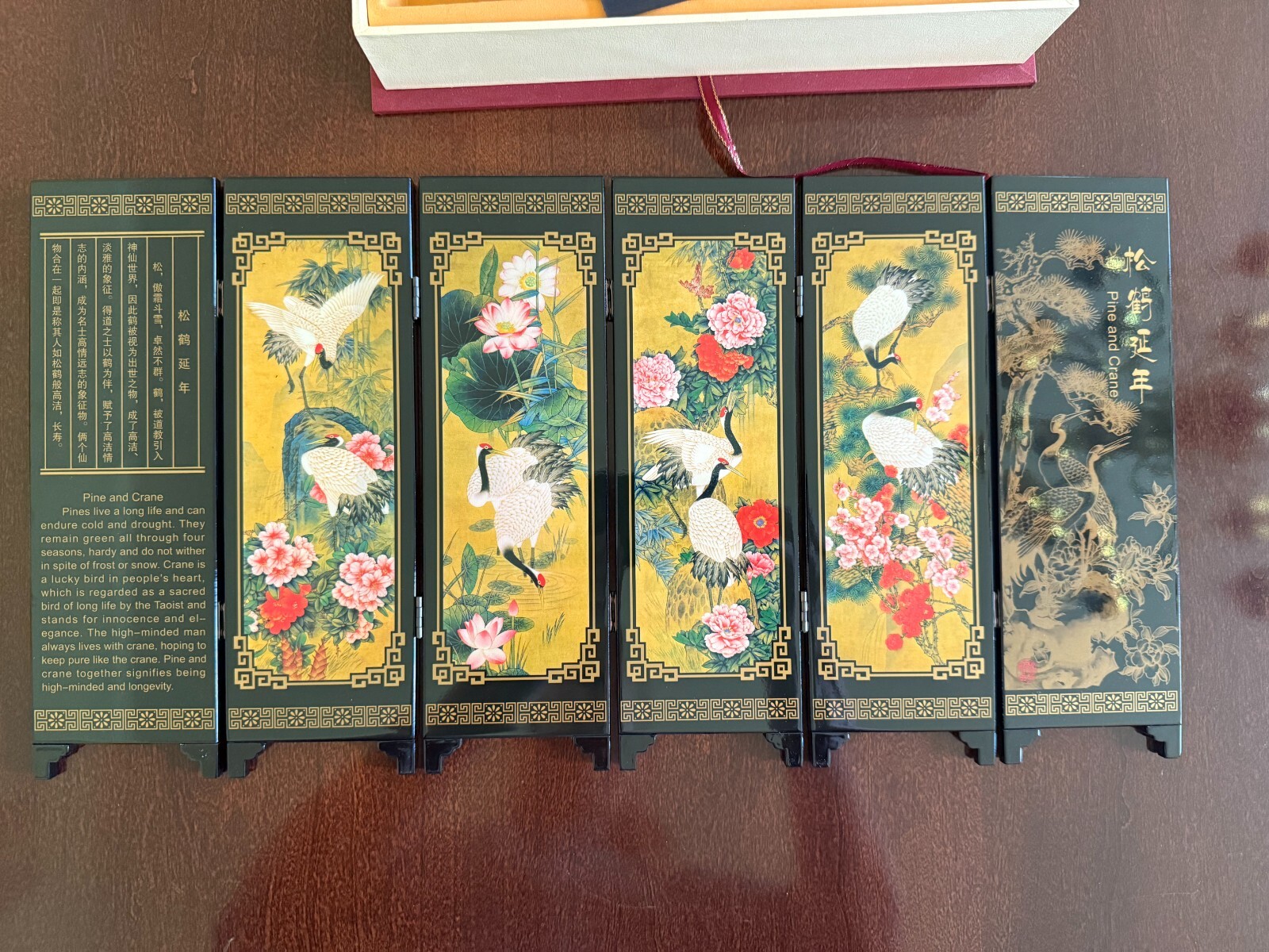 Asian Lacquer Table Folding Screen features a beautiful “Pine & Crane” scenes