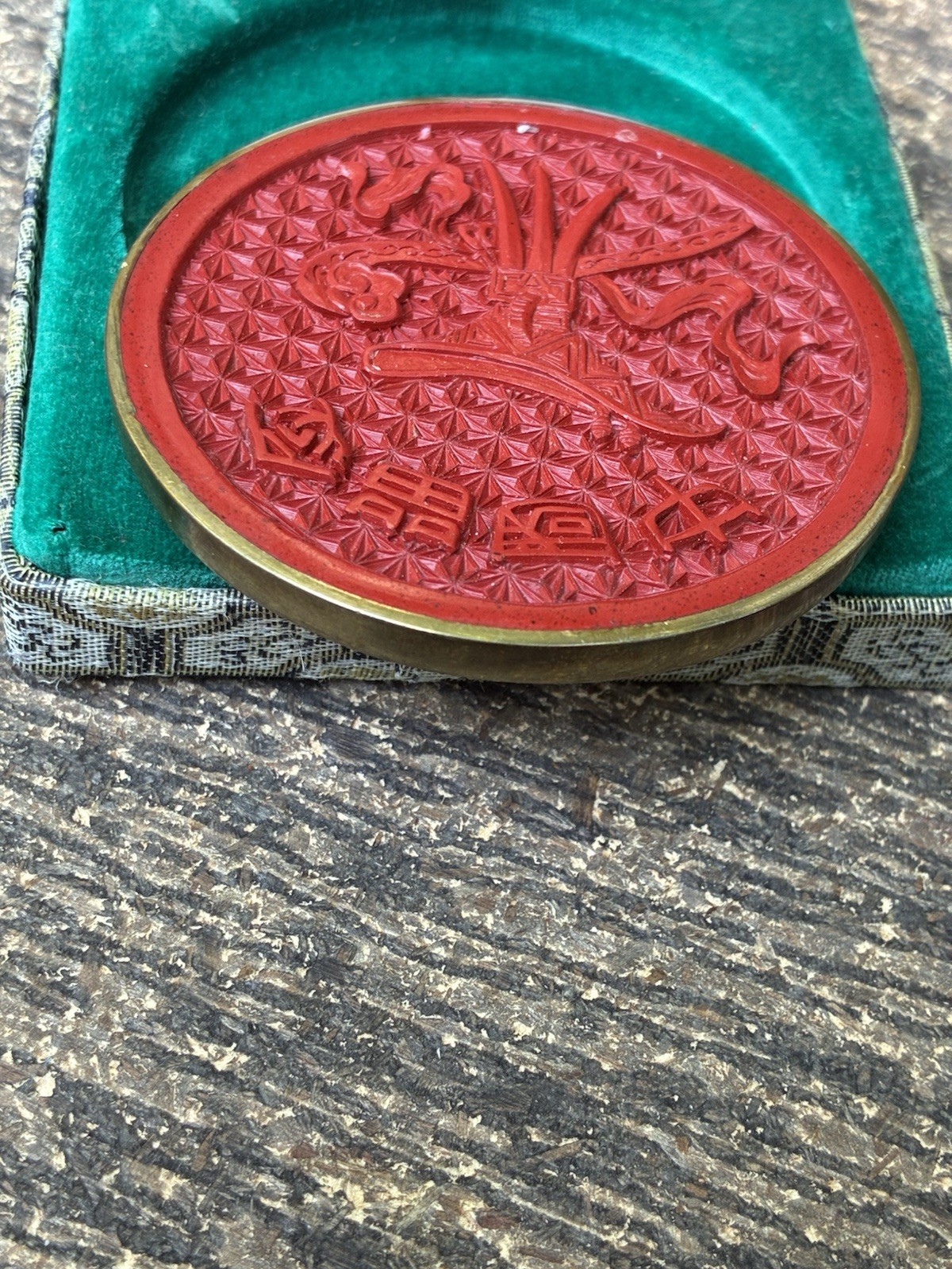 Chinese carved lacquer medallion and ceramic face mask miniatures