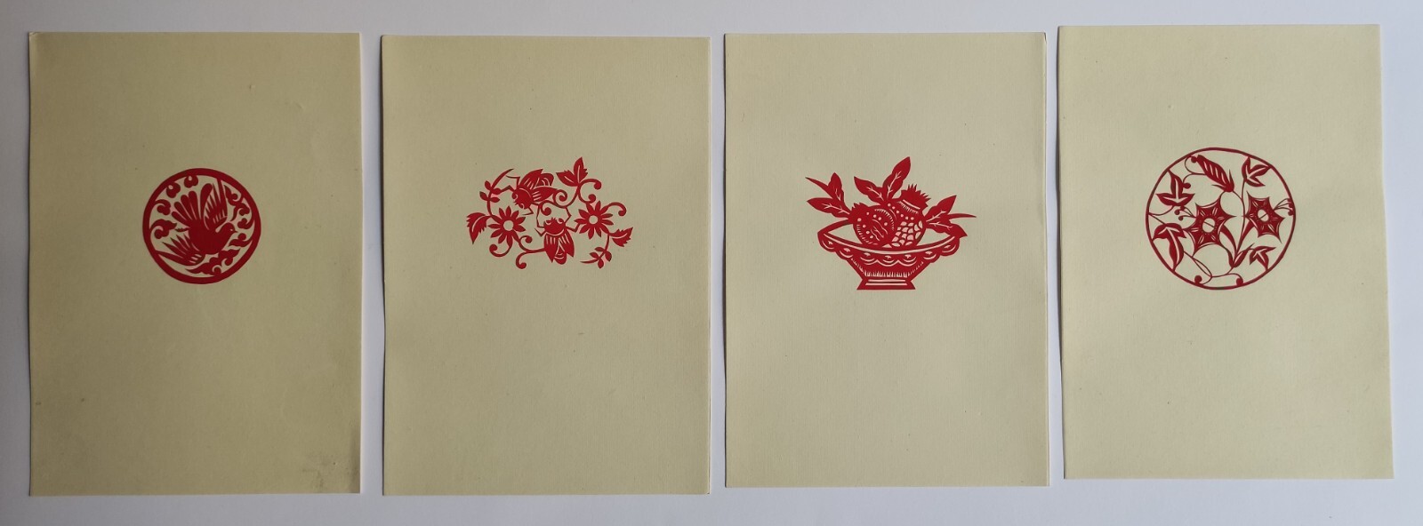 VINTAGE PORTFOLIO ALBUM WITH 16 CHINESE PAPER-CUTS – 1955