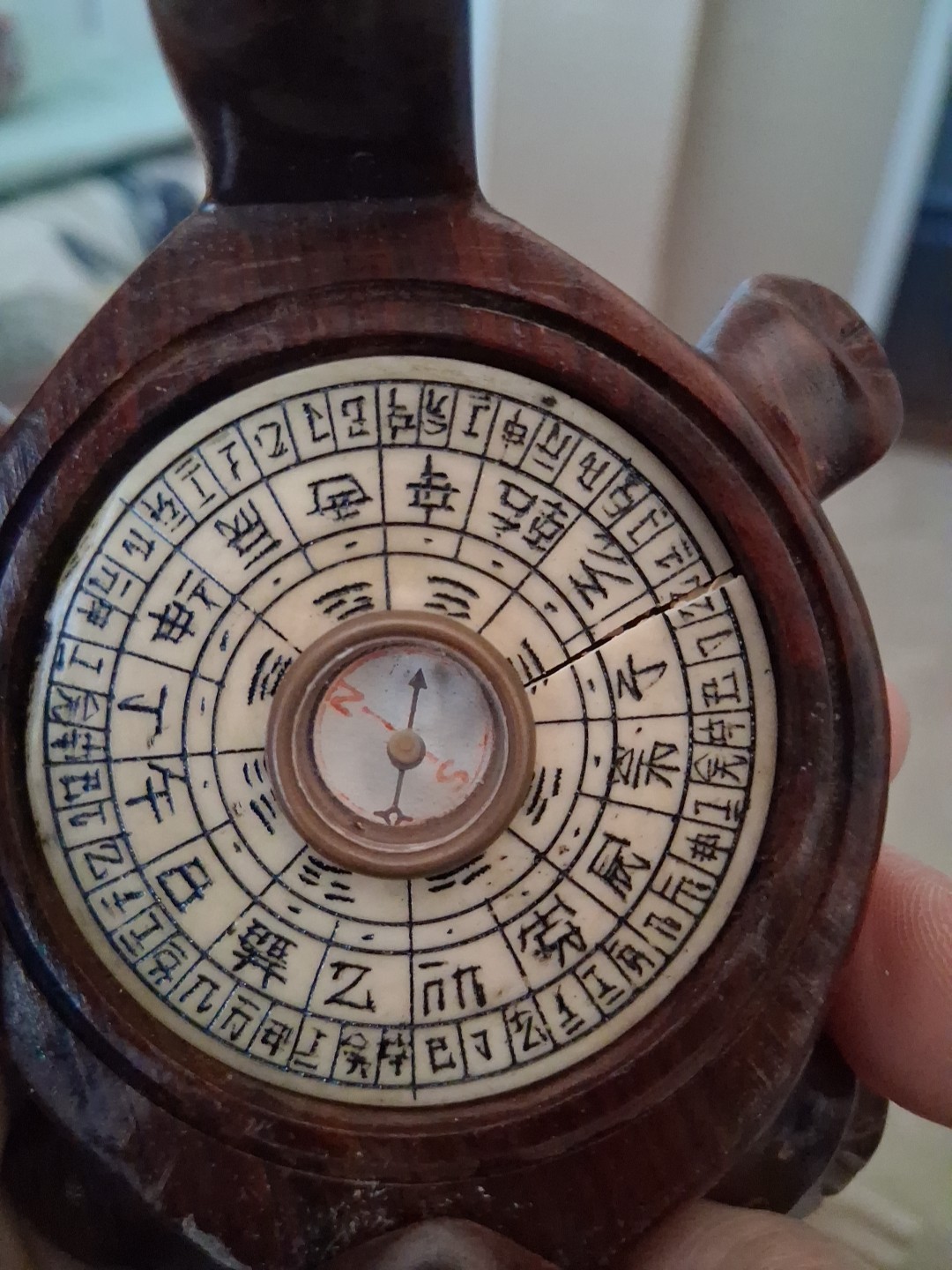 carved wood turtle with enlayed compass and chinese carved symbols