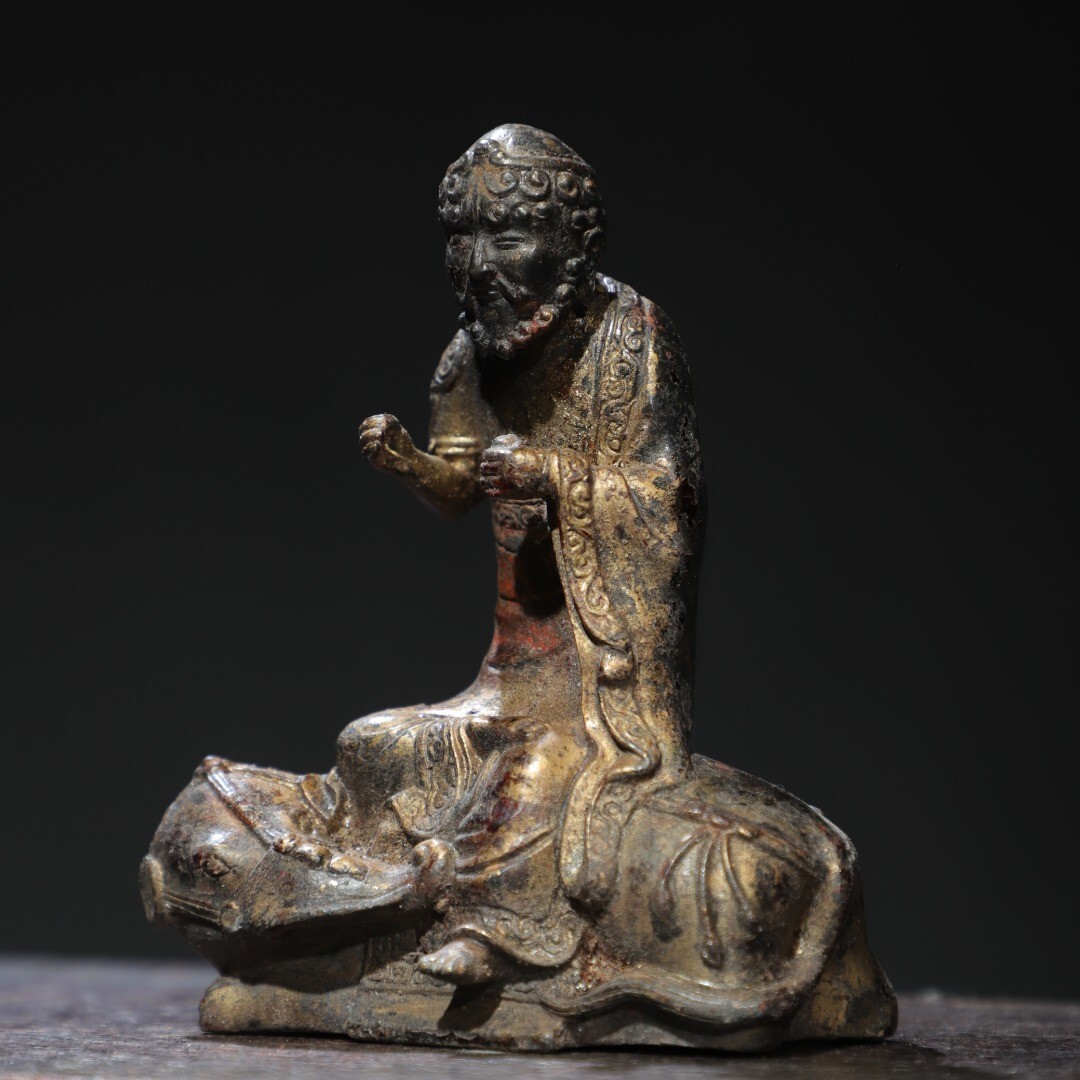 Bronze and gold [Arhat] Buddha statue